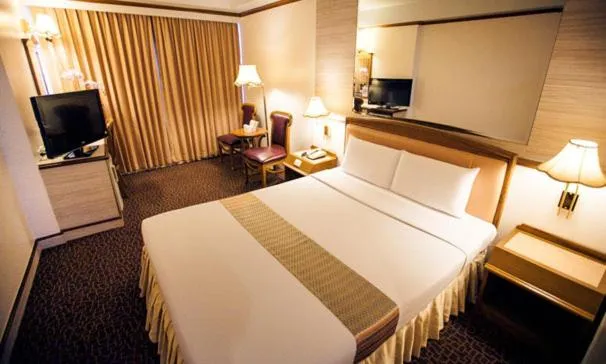 Bed in V.L. Hatyai Hotel