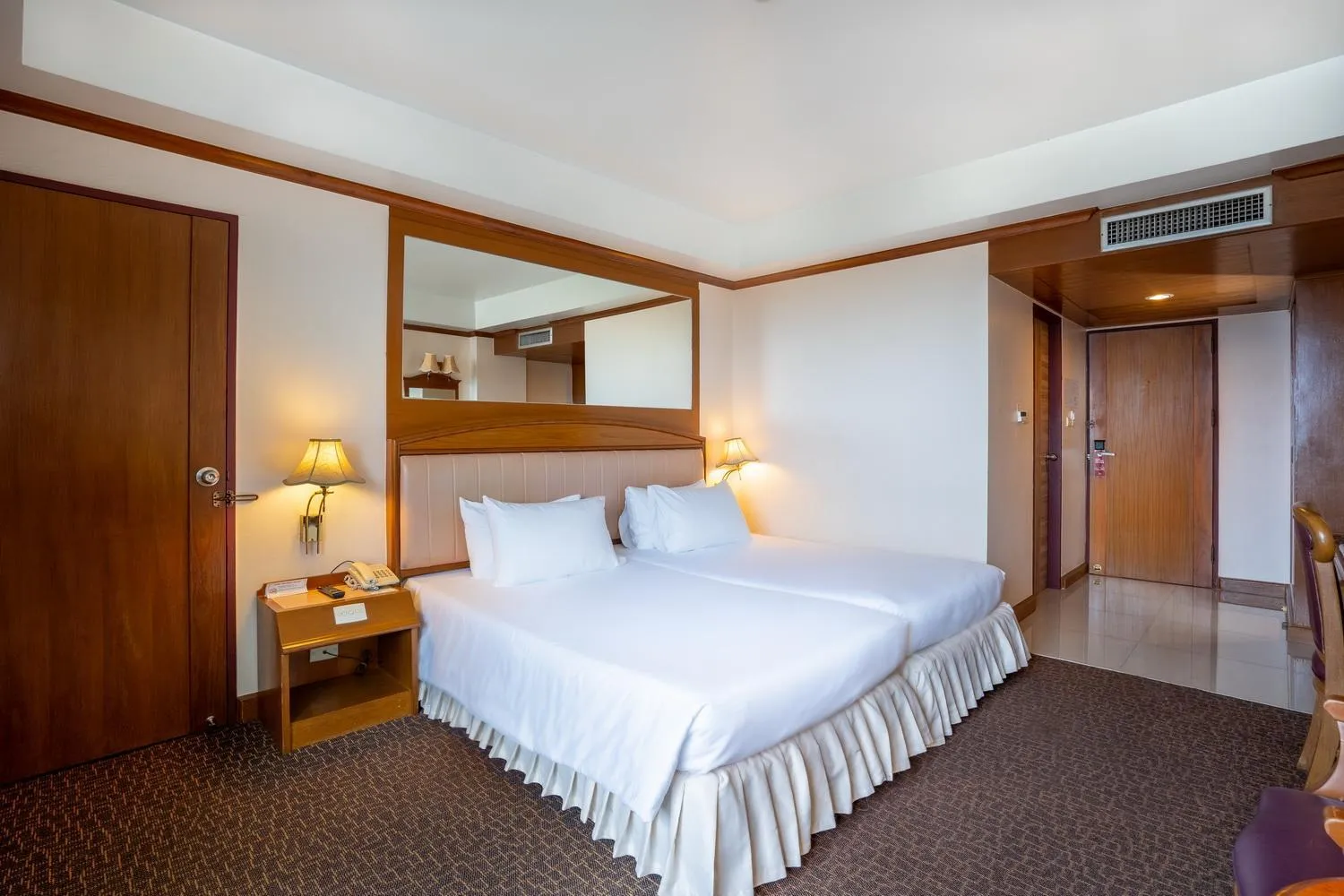 Bed in V.L. Hatyai Hotel