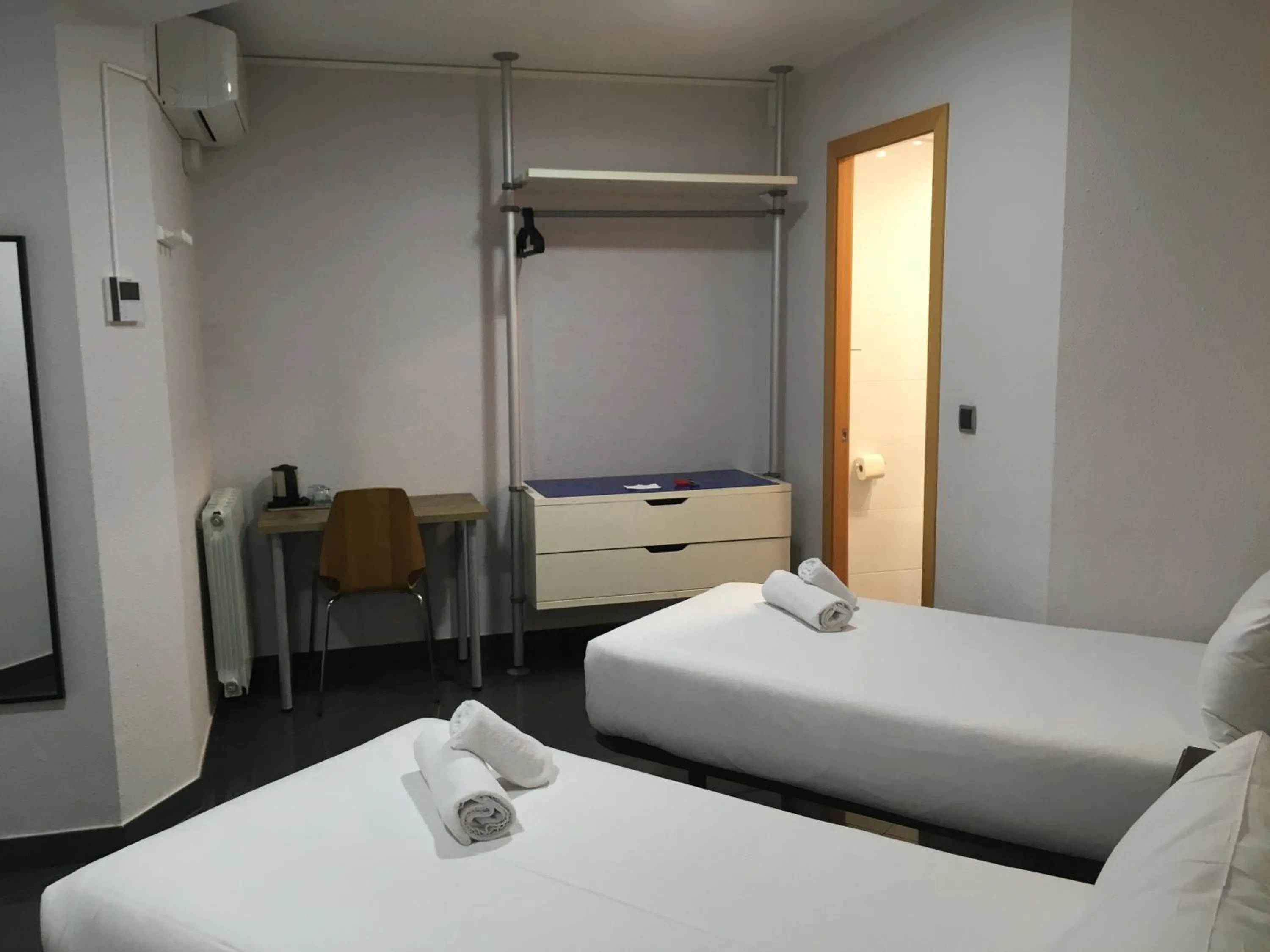 Bed in Hostal Levante Barcelona