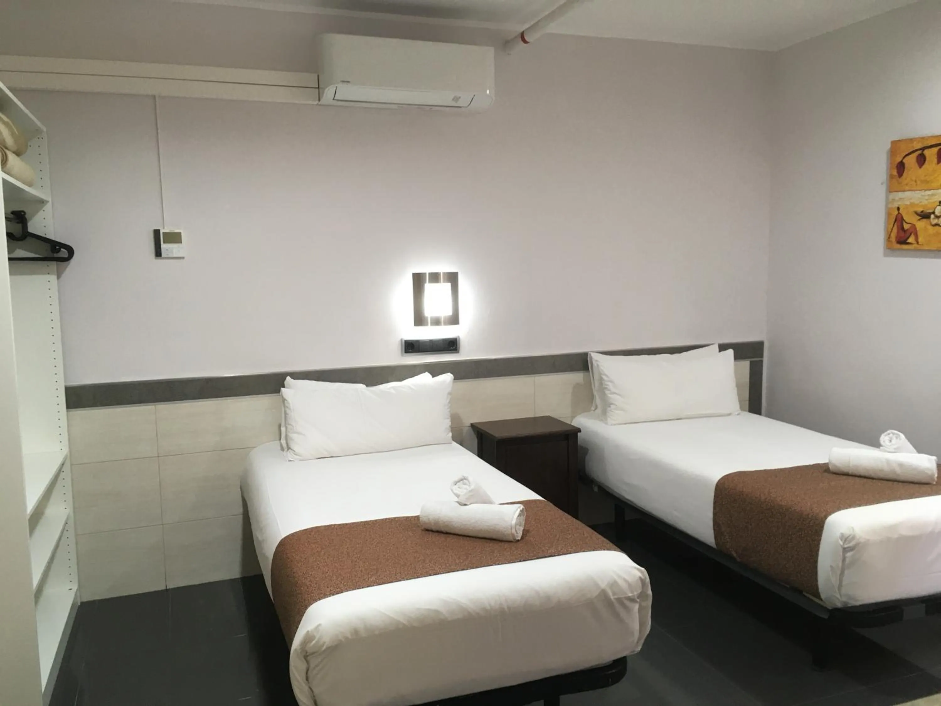 Bed in Hostal Levante Barcelona