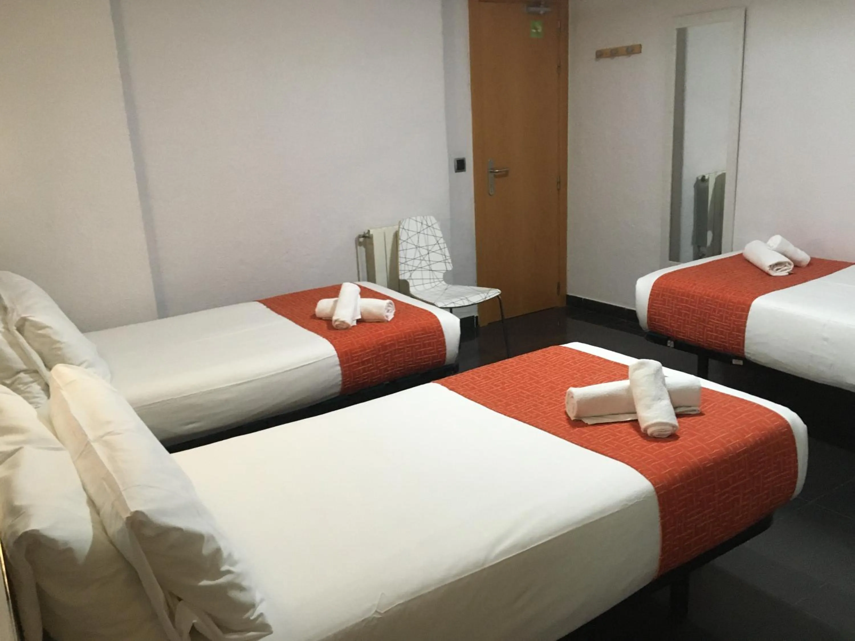 Bed in Hostal Levante Barcelona