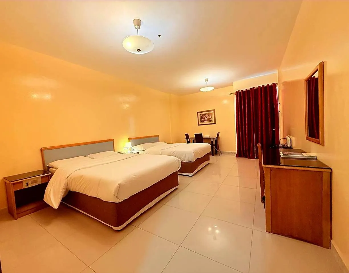 Bed in Al Buhaira Hotel Apartment