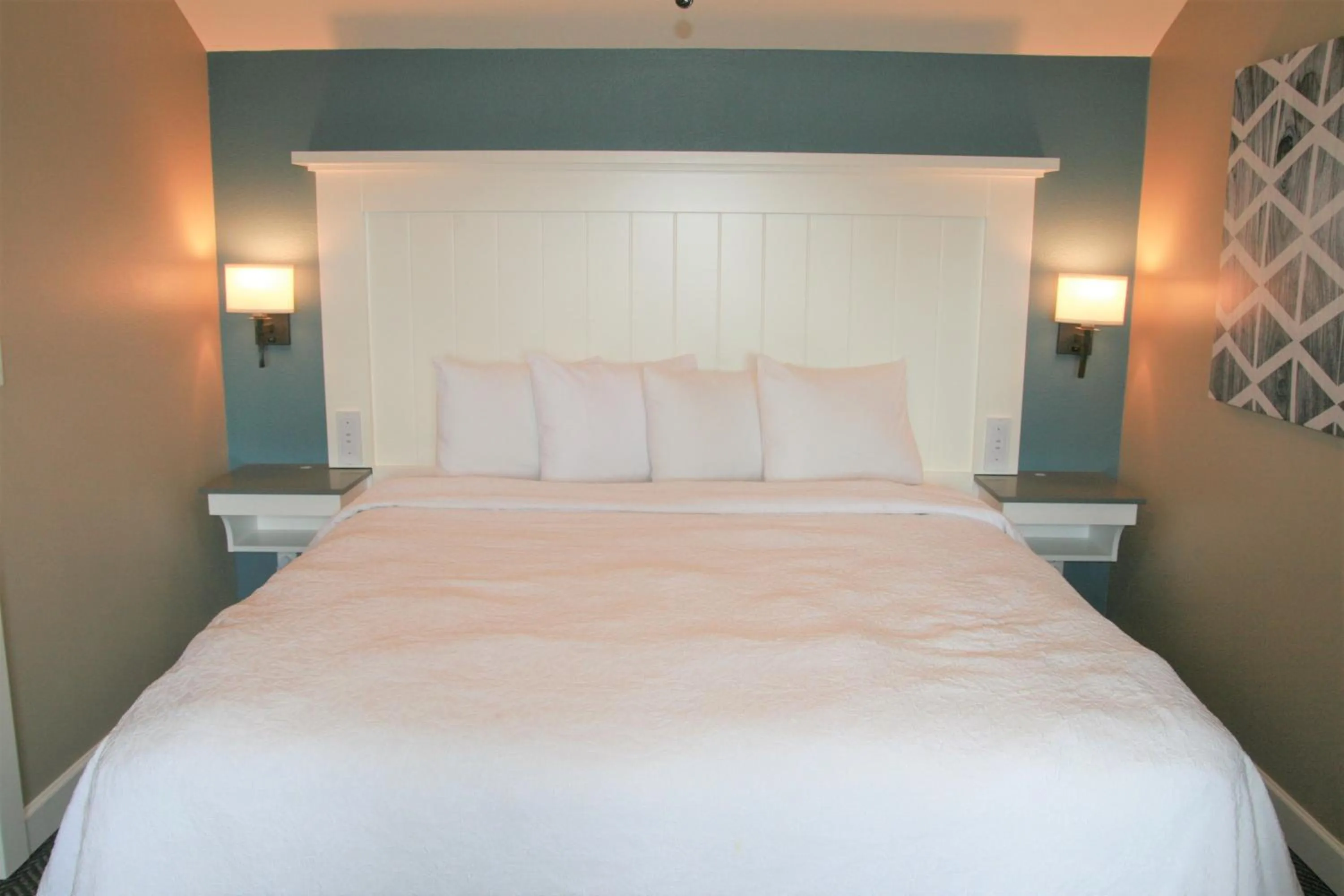 Bed in Waterside Suites and Marina