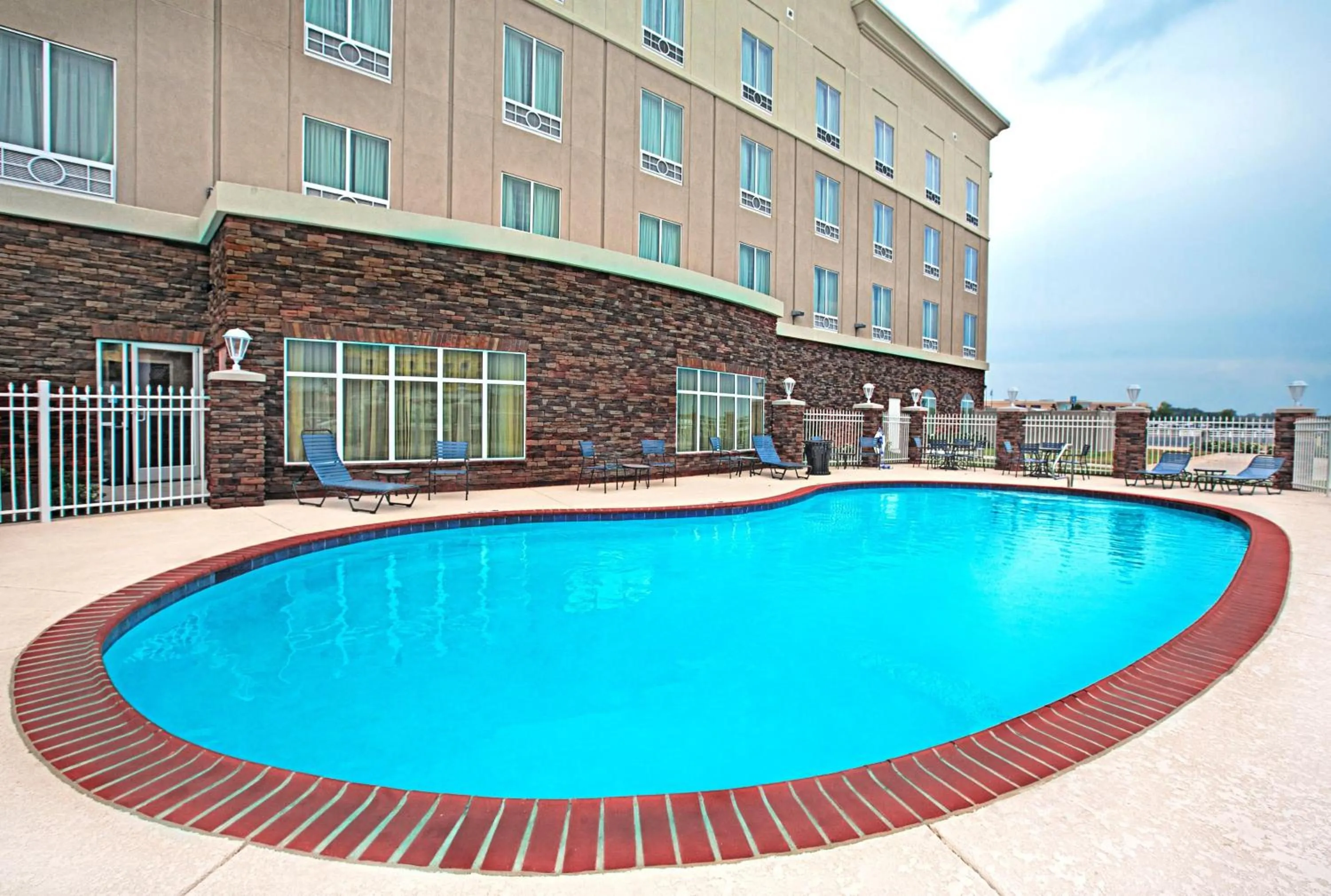Swimming pool in Holiday Inn Express and Suites Bossier City Louisiana Downs by IHG