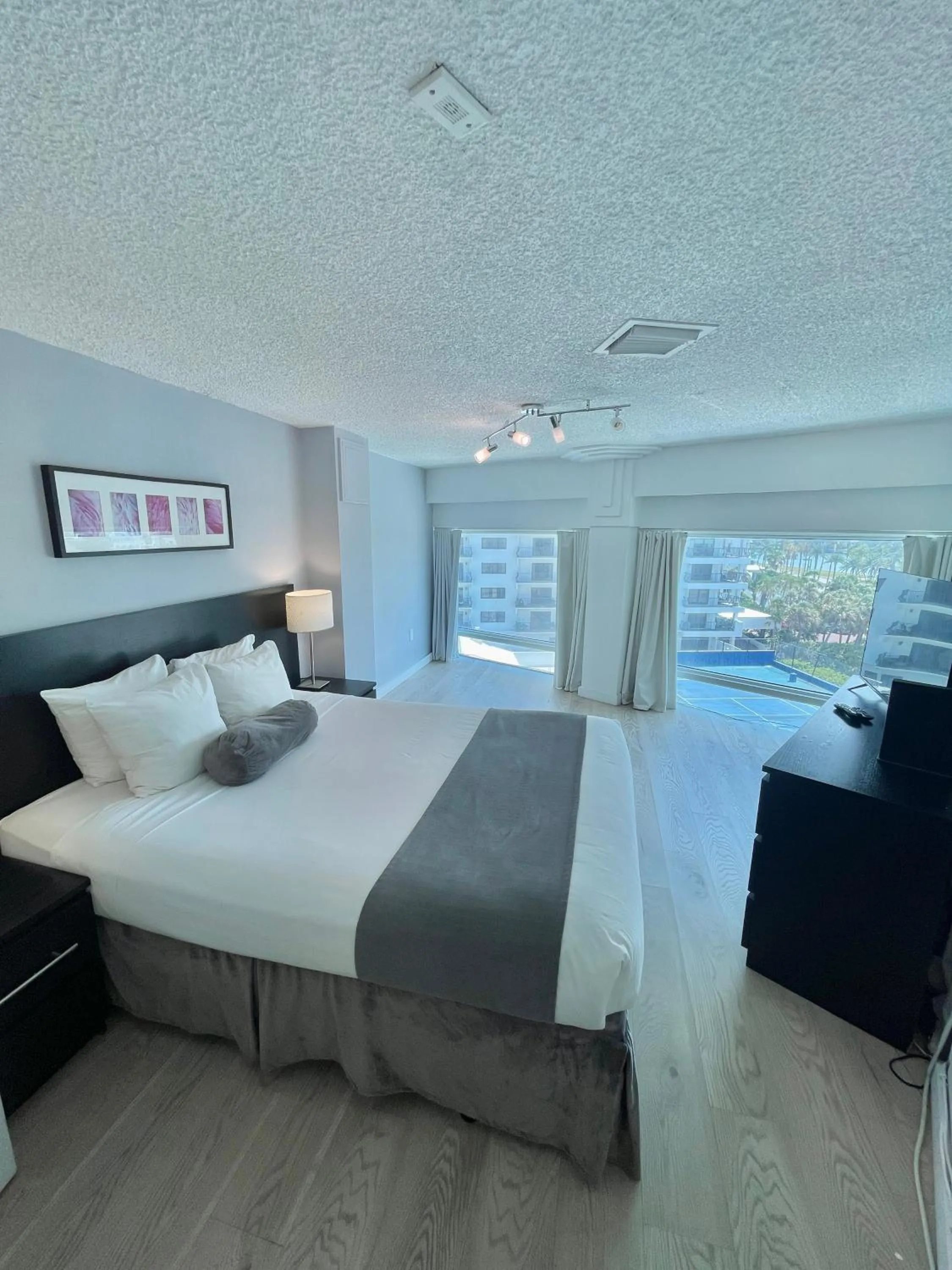 Bed in New Point Miami Beach Apartments