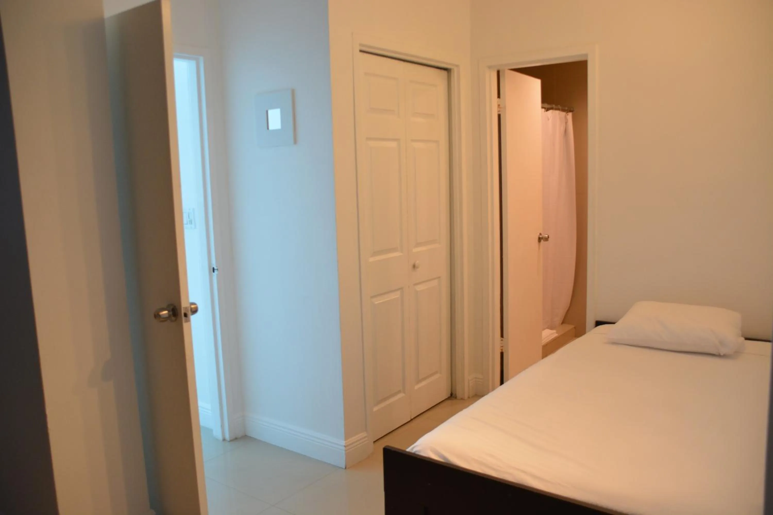 Bedroom, Bed in New Point Miami Beach Apartments