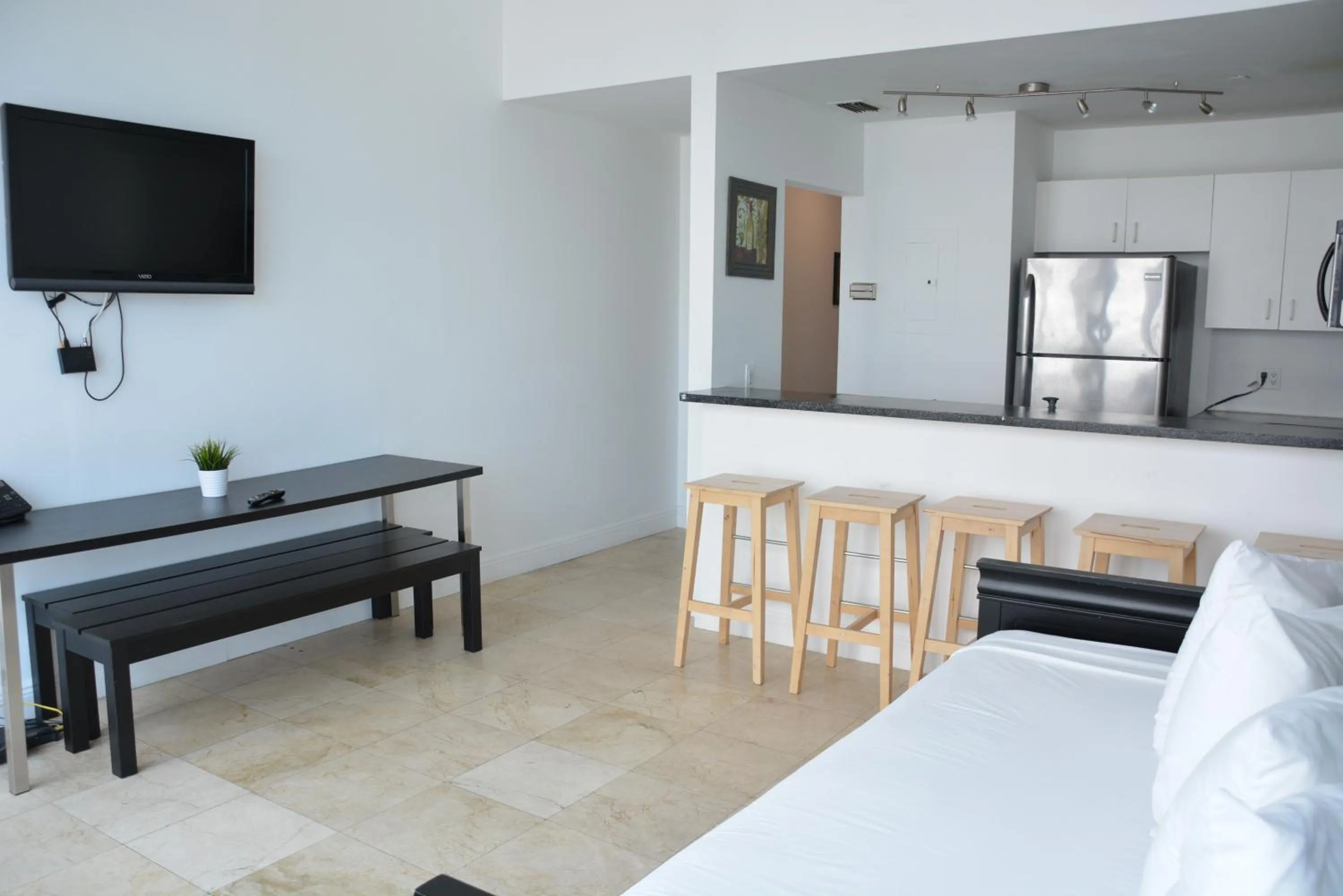 Living room, Bed in New Point Miami Beach Apartments