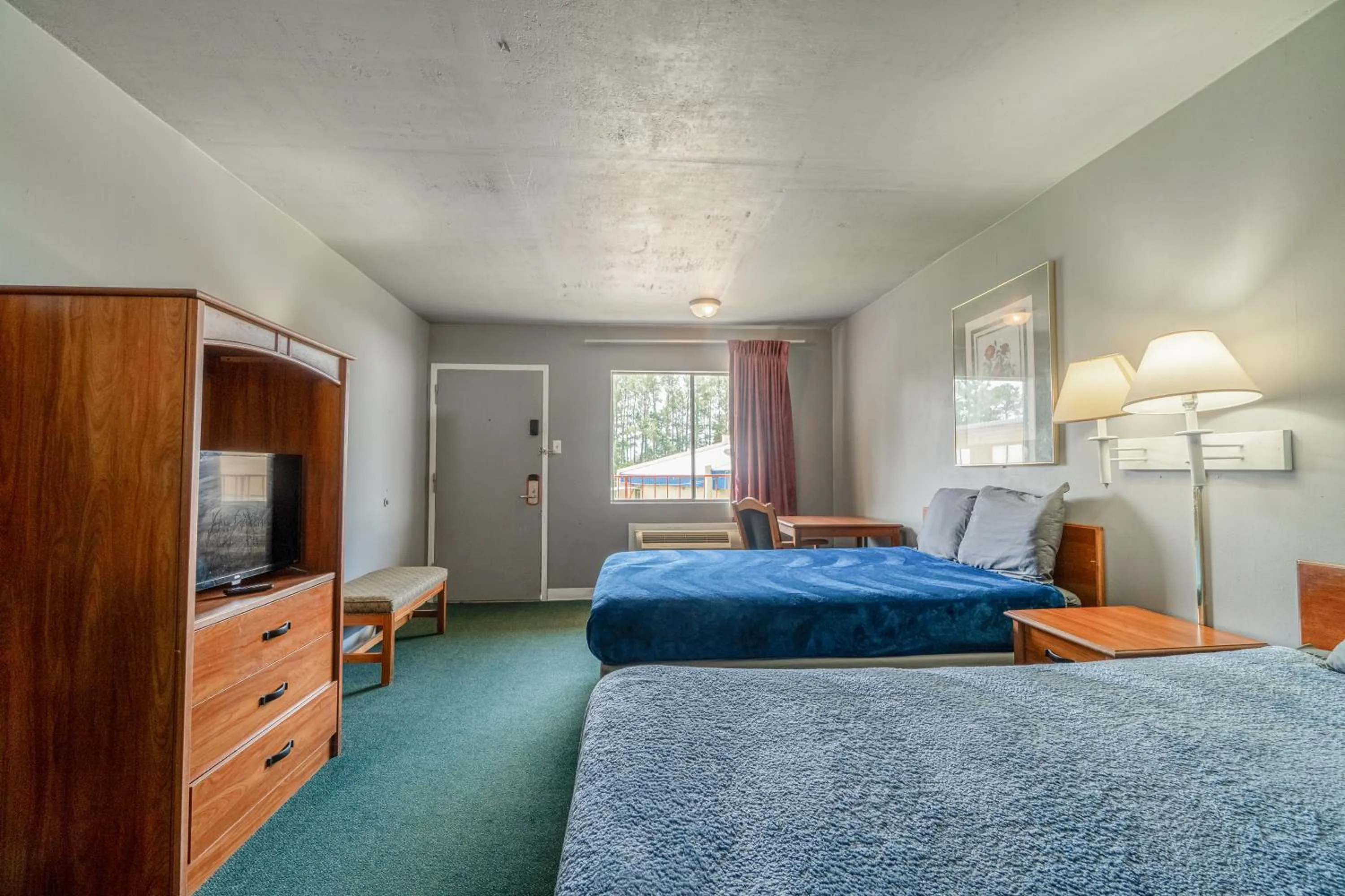 Bedroom, Bed in Economy Inn By OYO Livingston TX Hwy 59