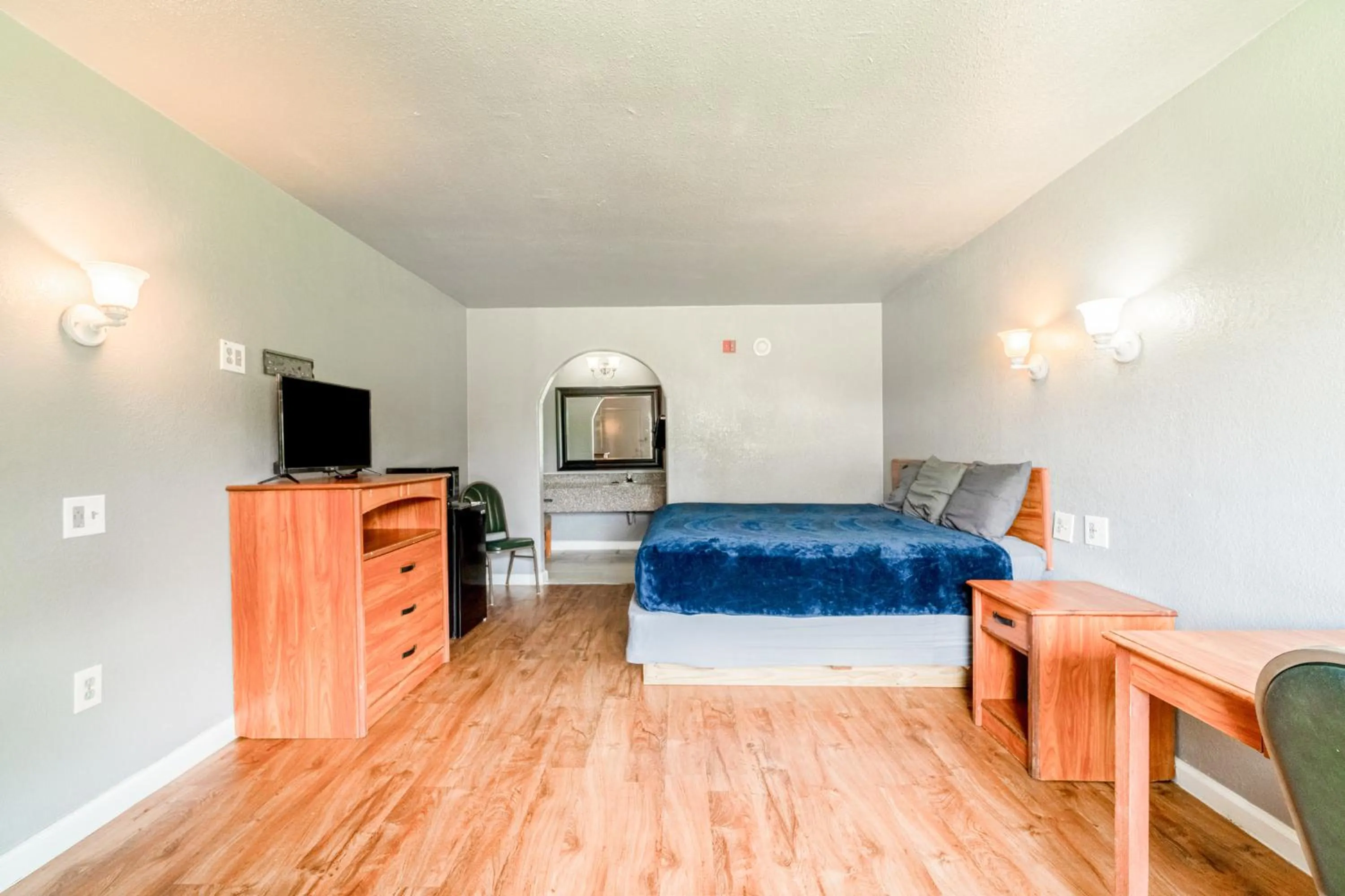 Bedroom in Economy Inn By OYO Livingston TX Hwy 59