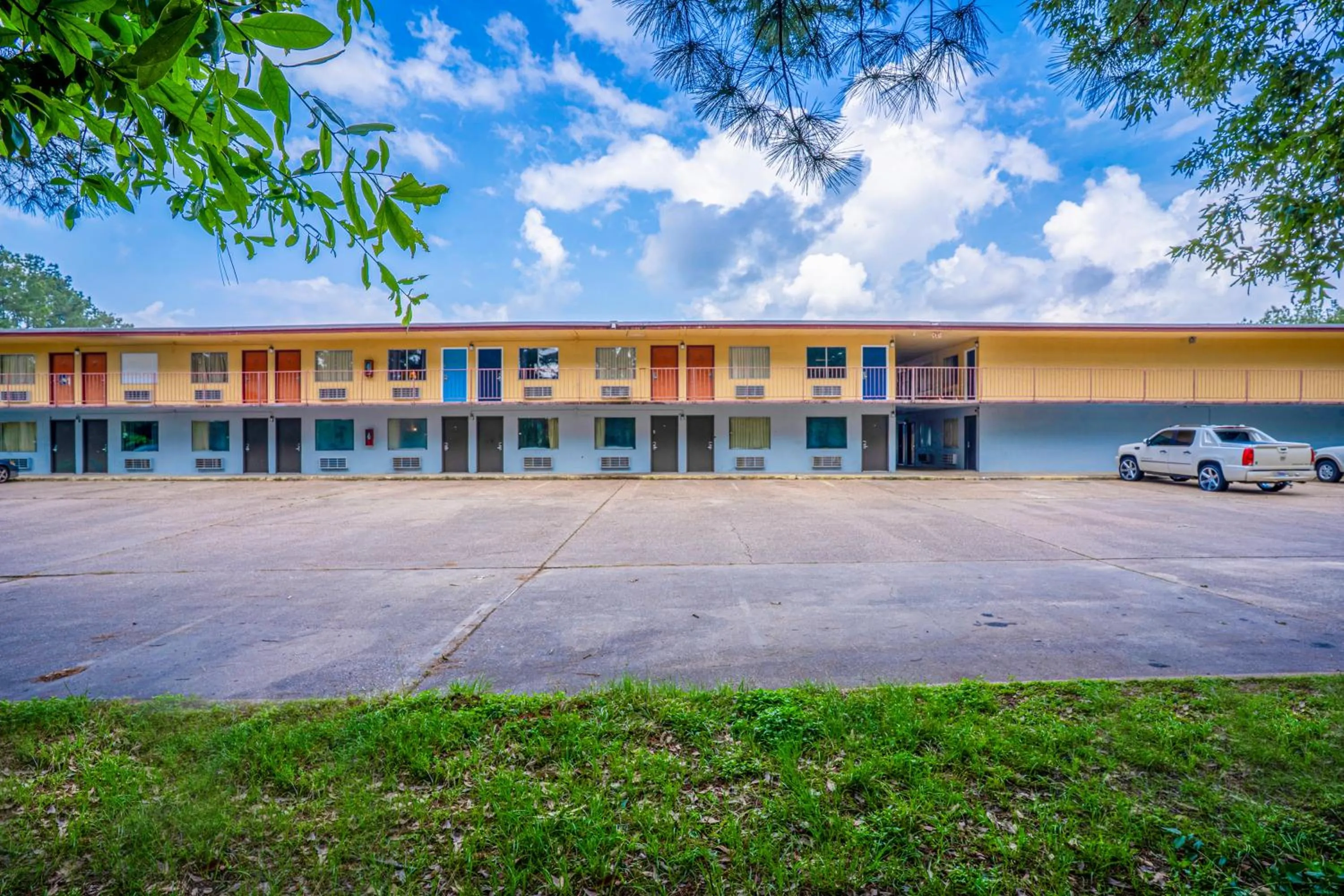 Property building in Economy Inn By OYO Livingston TX Hwy 59