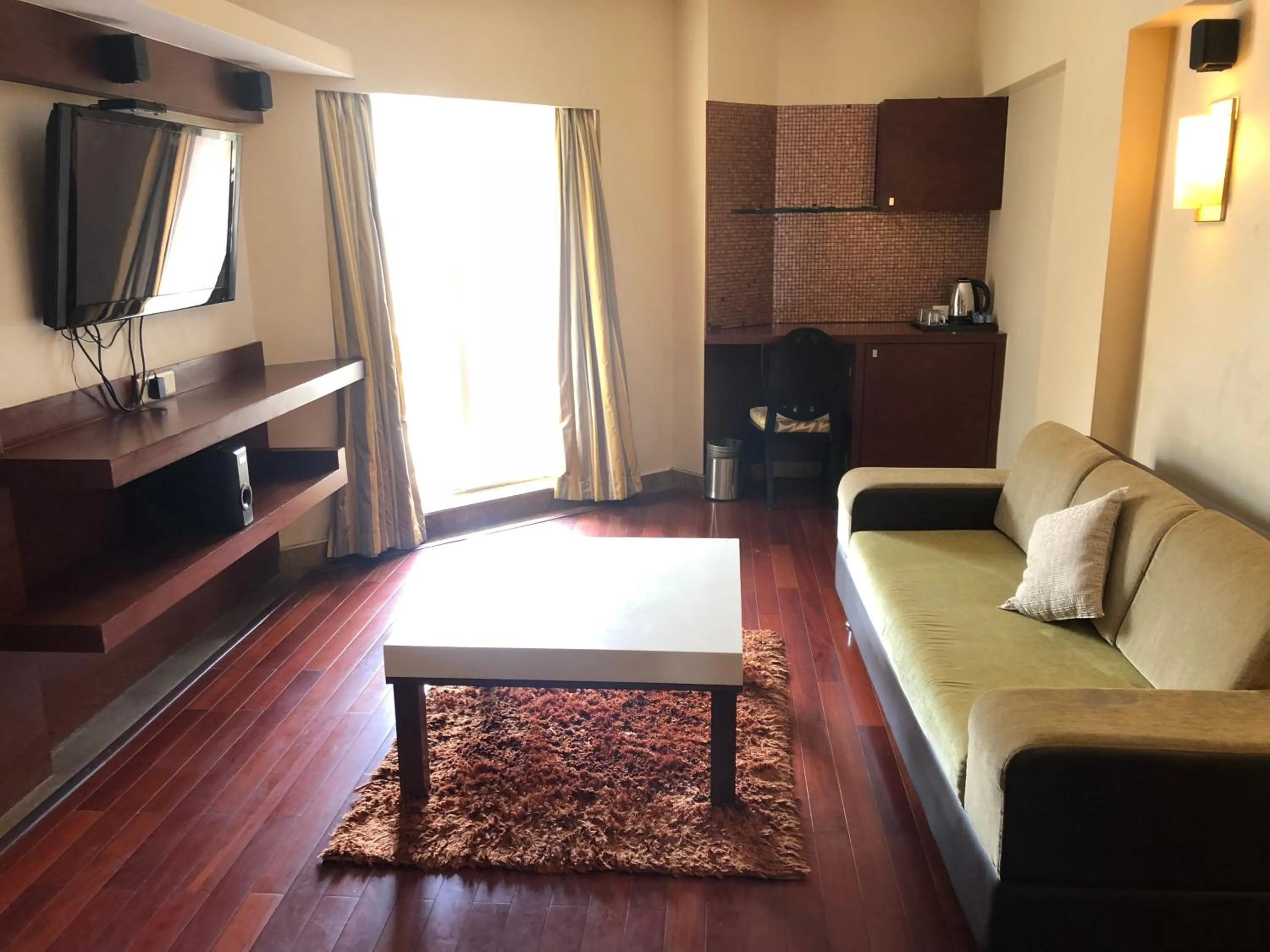 Living room in The Chariot Resort and Spa