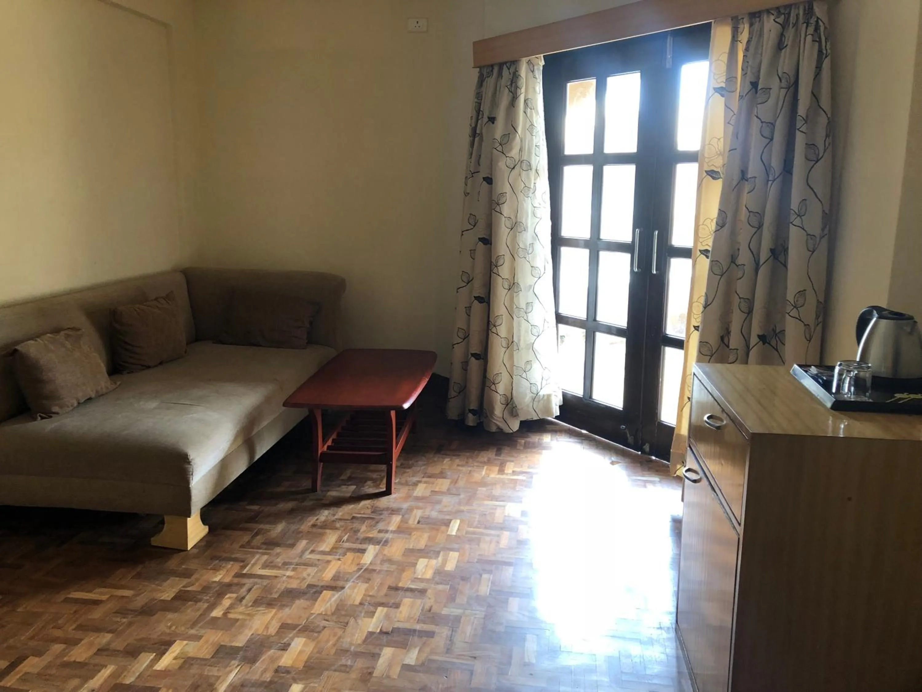 Living room in The Chariot Resort and Spa