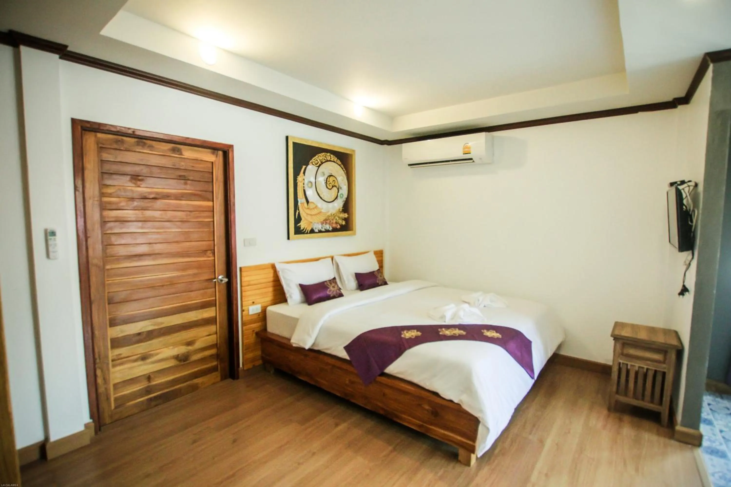 Bed in The Villager Fishermans Village