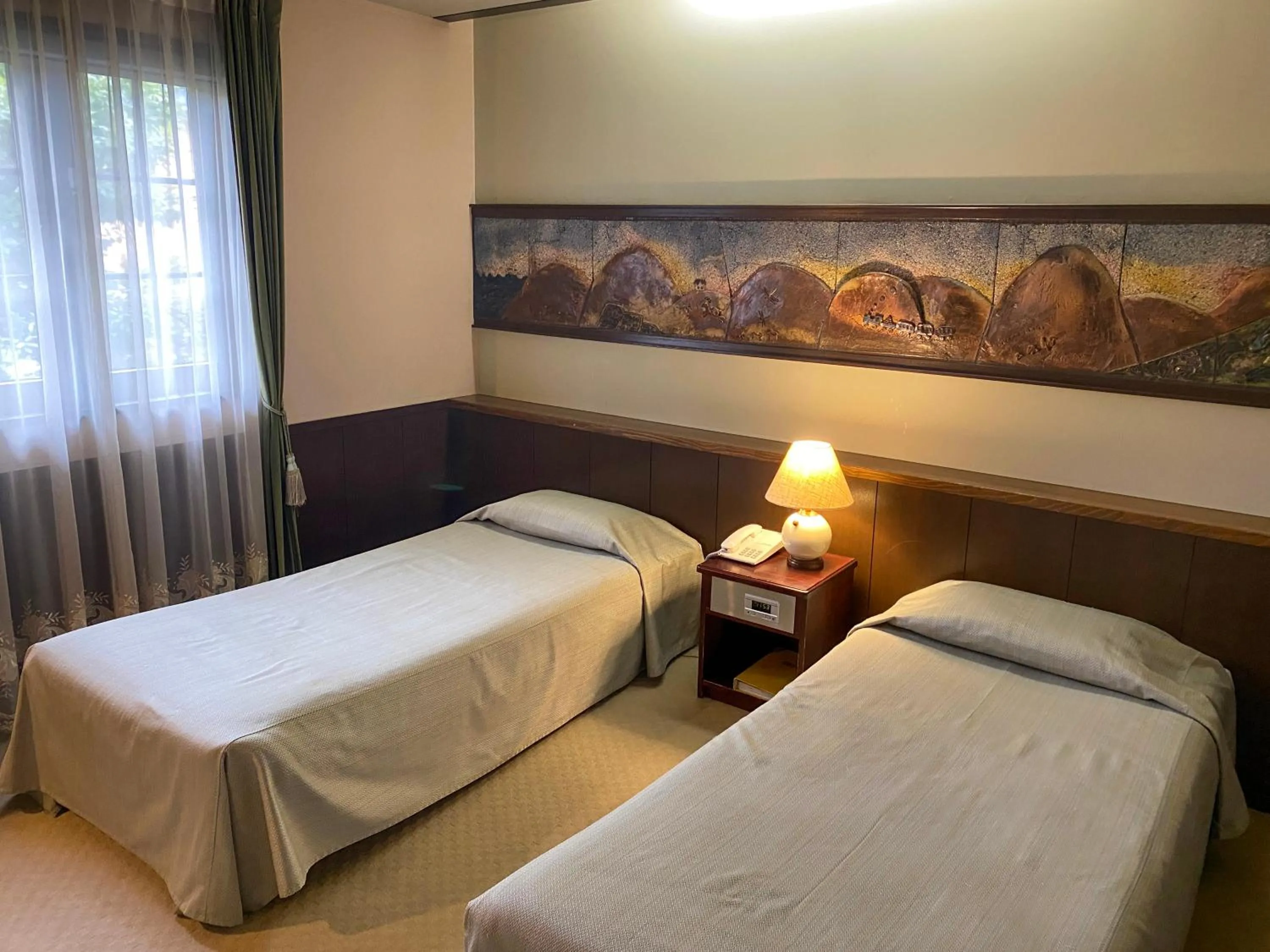 Bed in Camellia Inn Yukitsubaki