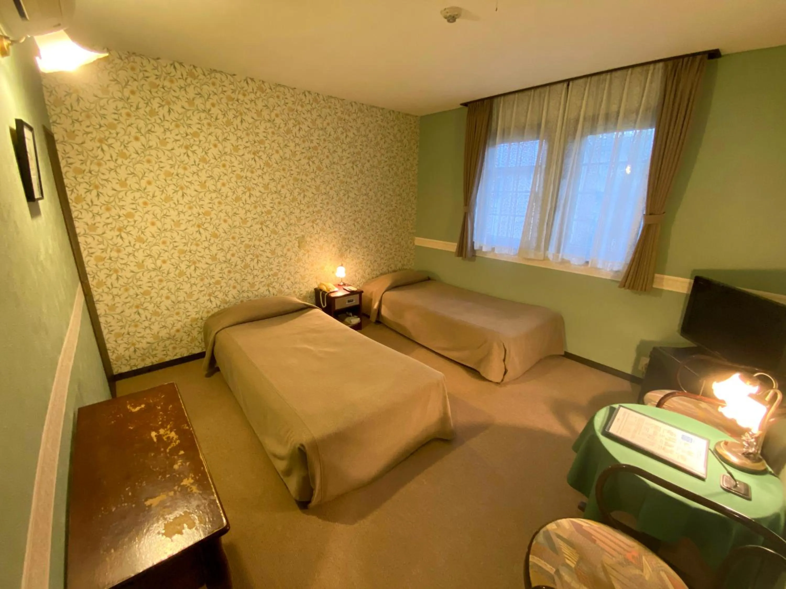 Bed in Camellia Inn Yukitsubaki