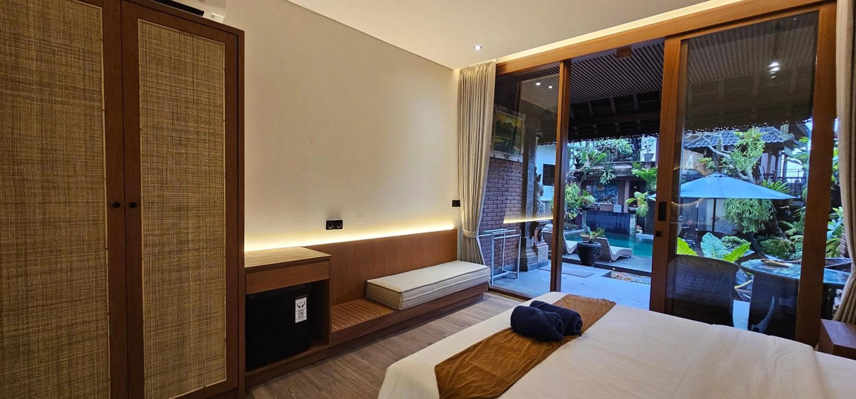 Photo of the whole room, Bed in Kun - Kun Guest House Ubud