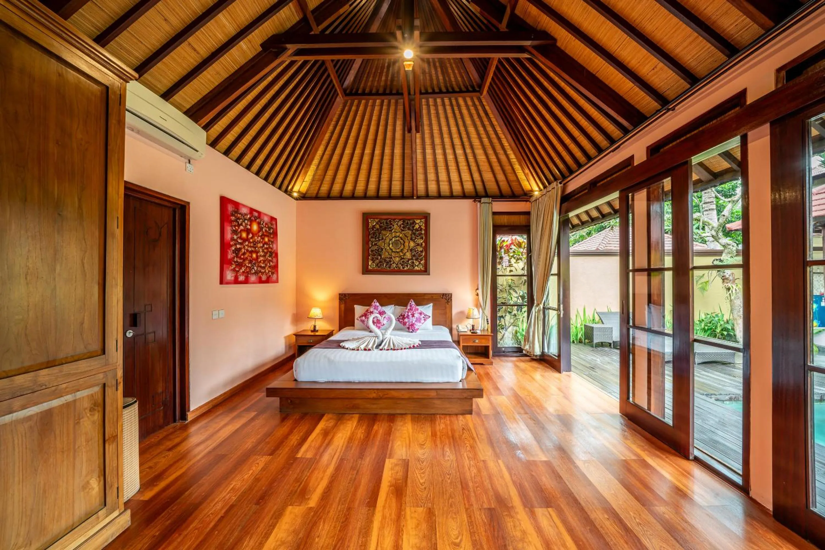 Bed in The Kampung Ubud Villa
