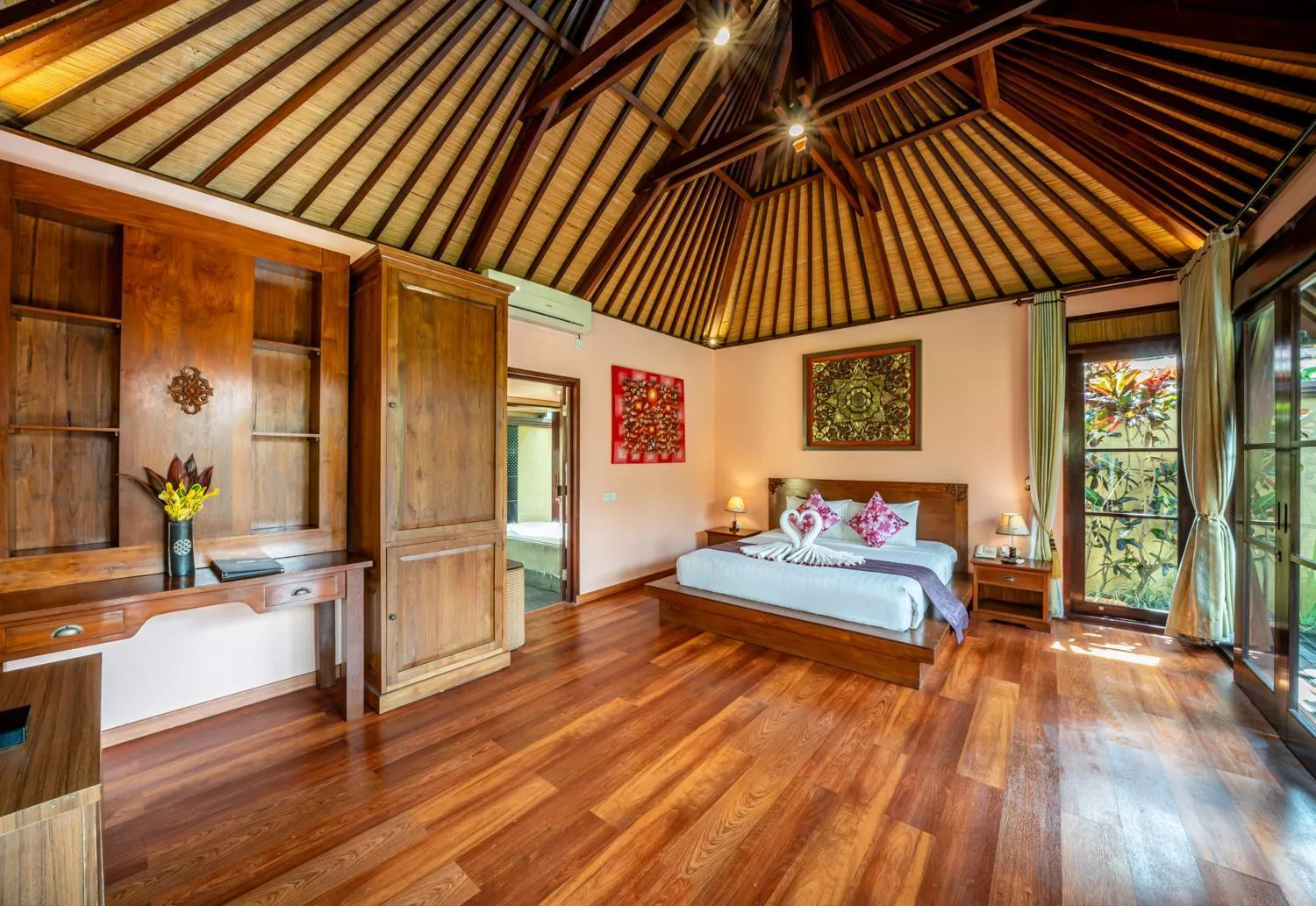 Bed in The Kampung Ubud Villa