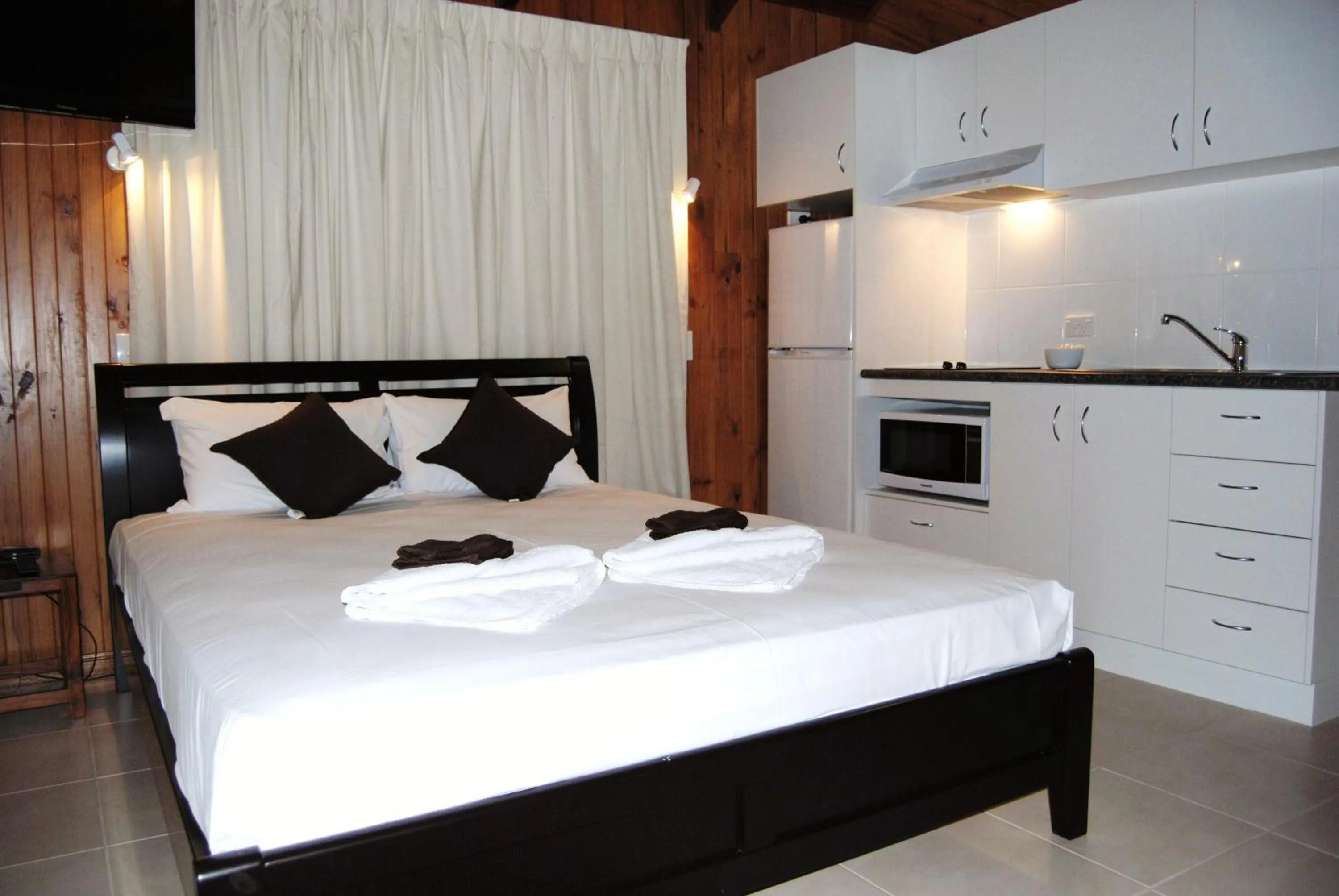 Bed in Airlie Beach Apartments