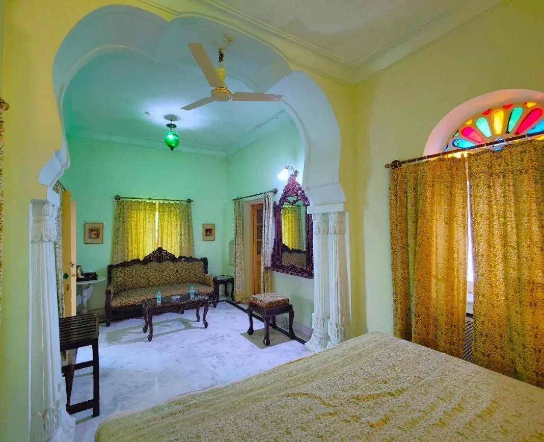 Bed in Palkiya Haveli - Heritage Hotel