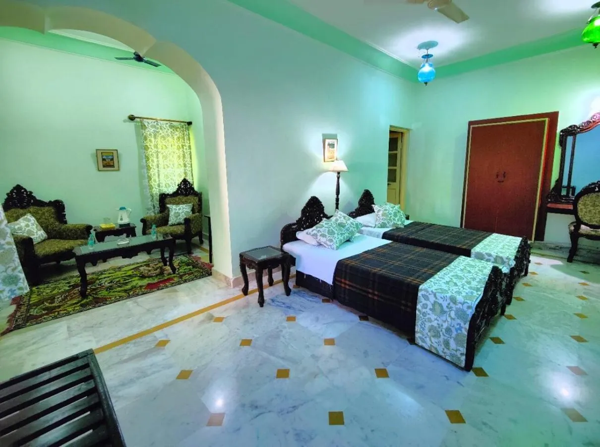 Bed in Palkiya Haveli - Heritage Hotel