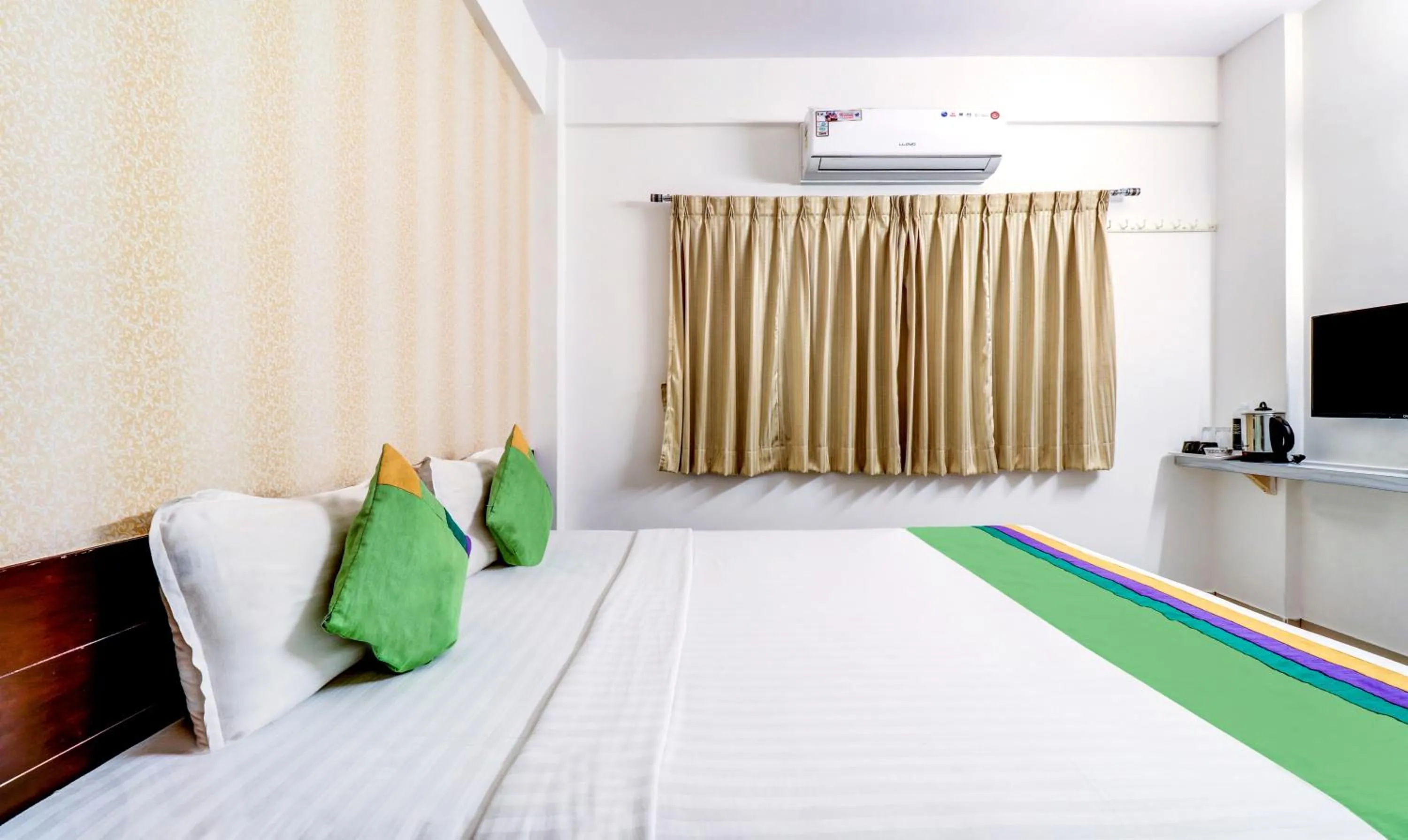 Bedroom, Bed in Treebo Saga Apartment