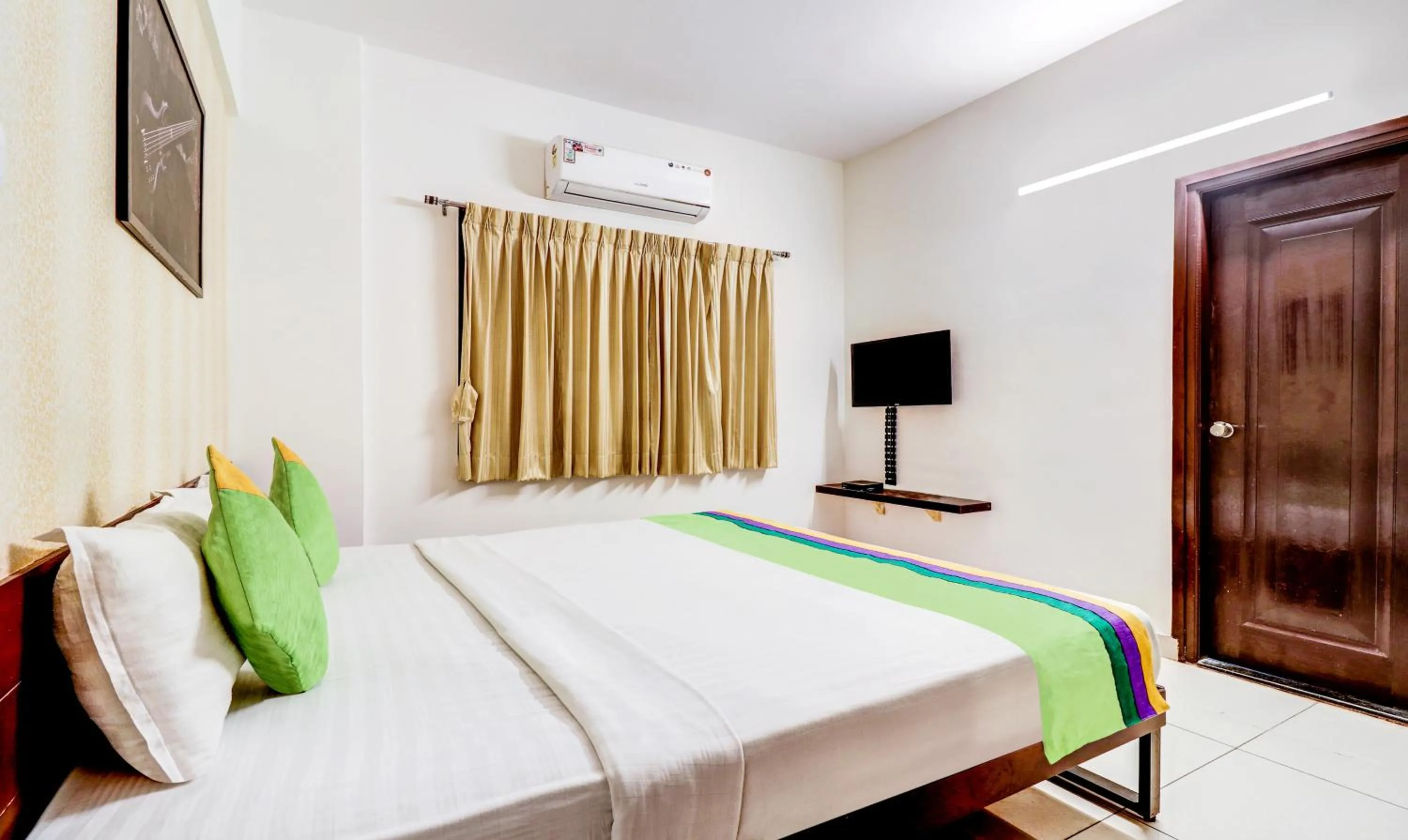 Bedroom, Bed in Treebo Saga Apartment