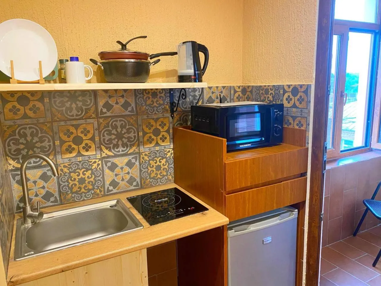 Kitchen or kitchenette in Hotel Orange Kutaisi