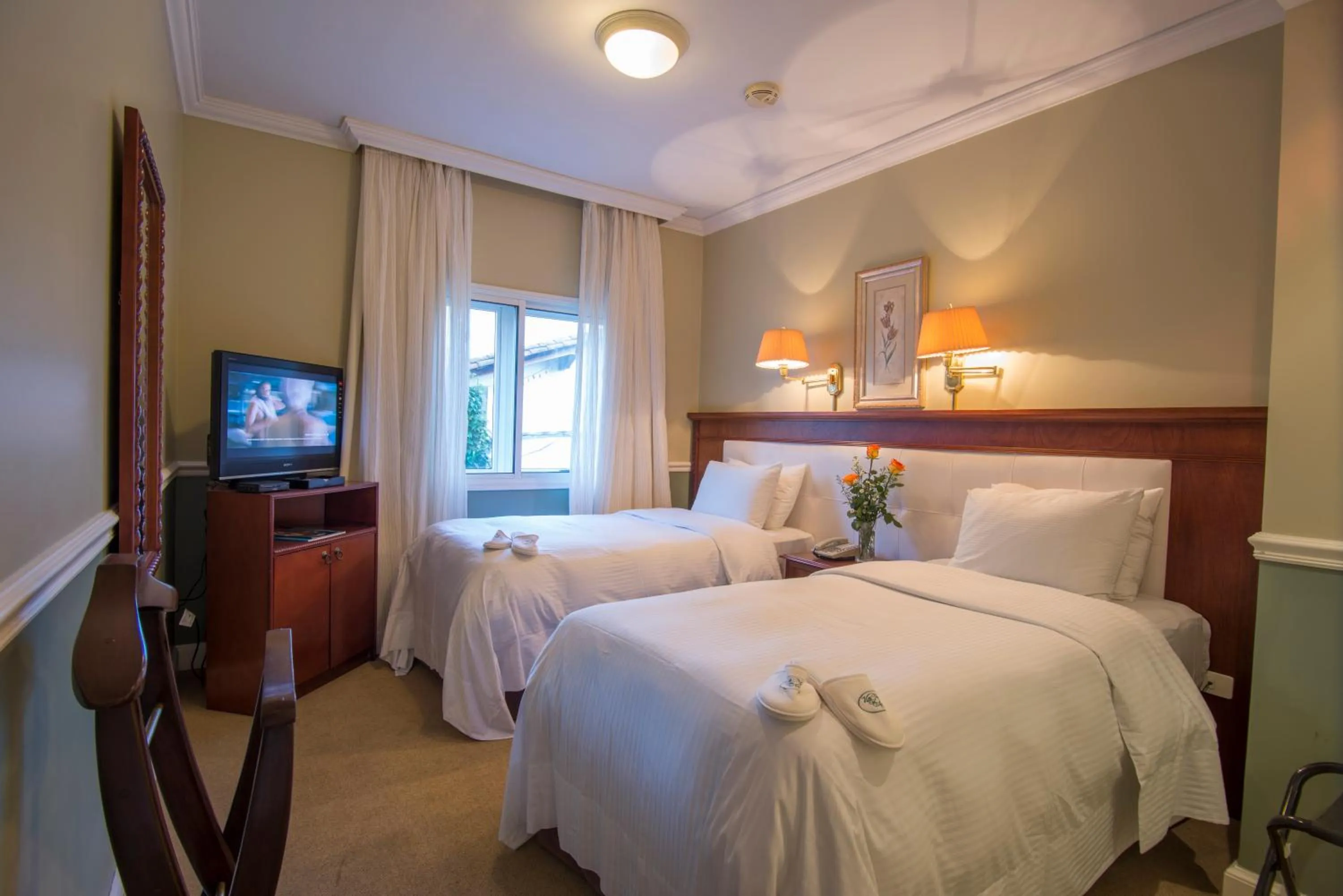 Bed in Hotel Villa Morra Suites