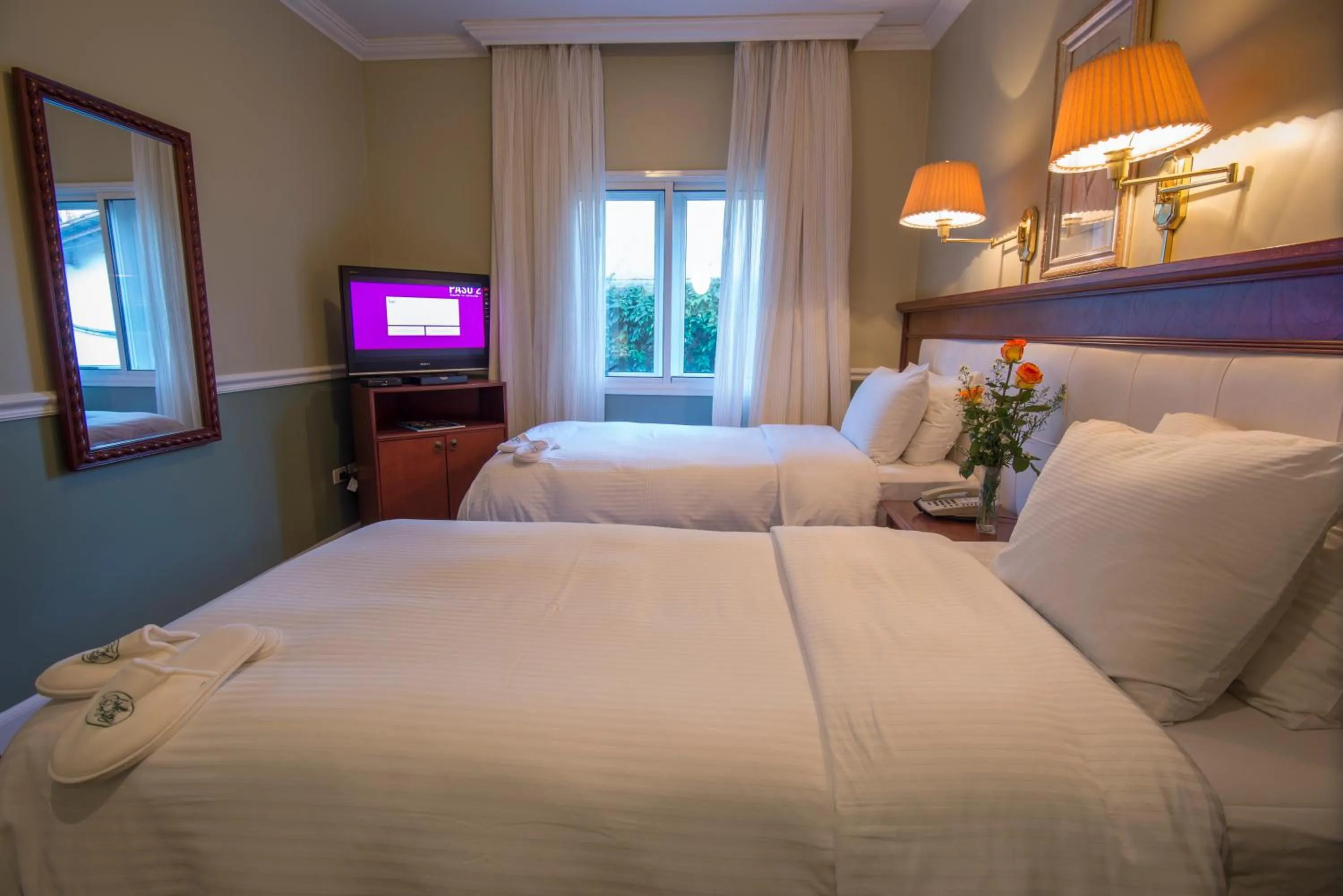 Bed in Hotel Villa Morra Suites