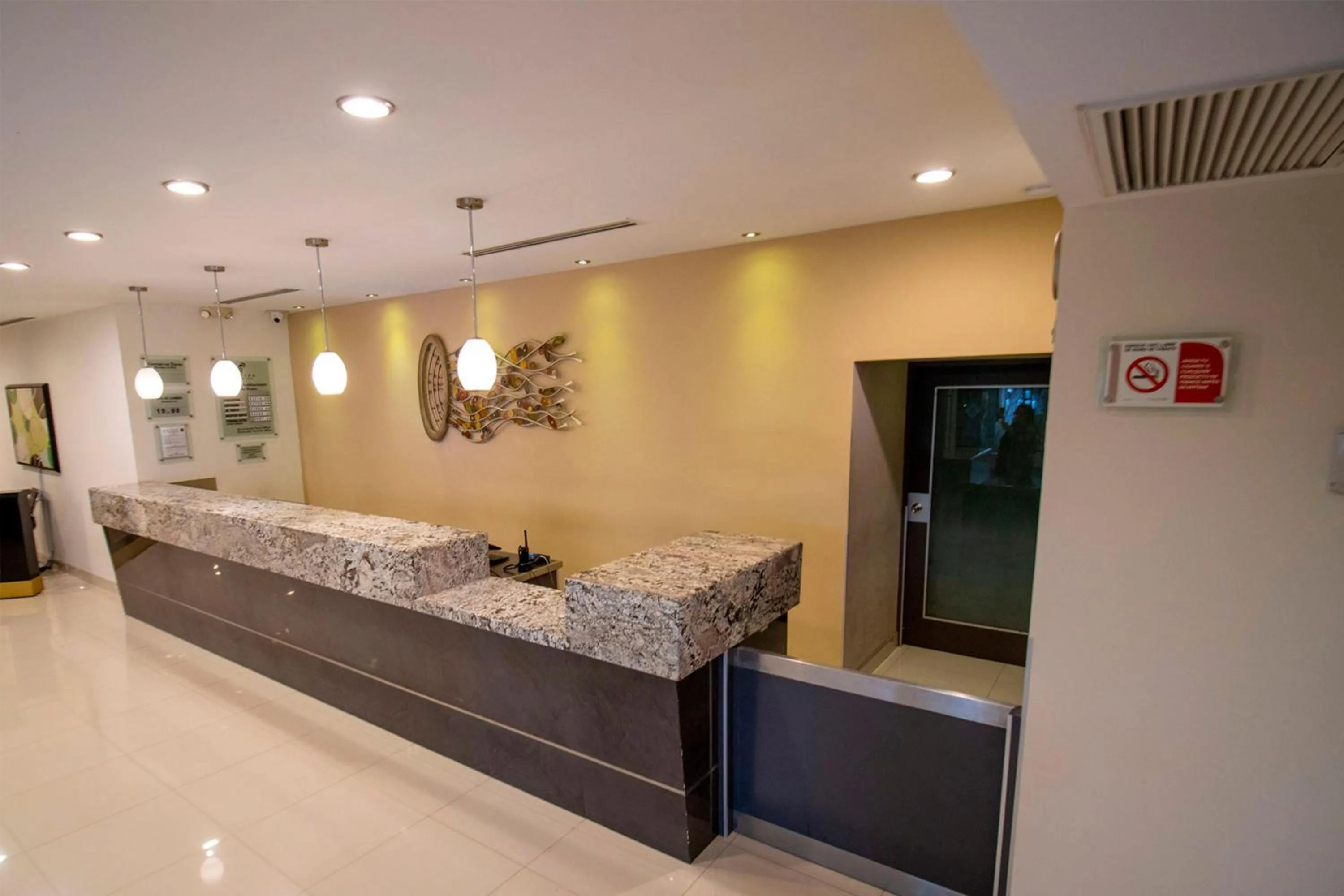 Lobby or reception in Araiza Palmira Hotel y Centro de Convenciones