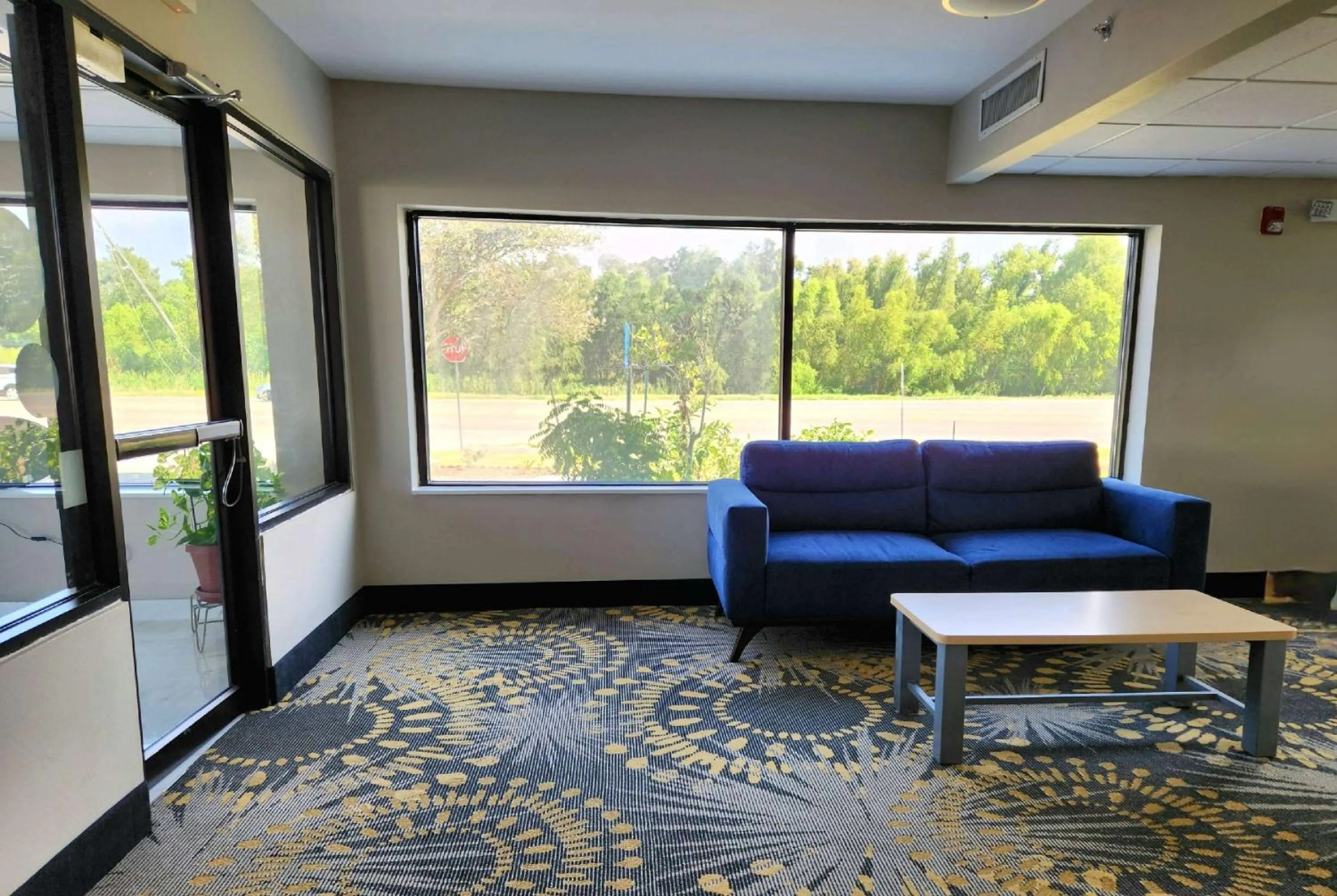 Lobby or reception in Days Inn by Wyndham LaPlace- New Orleans