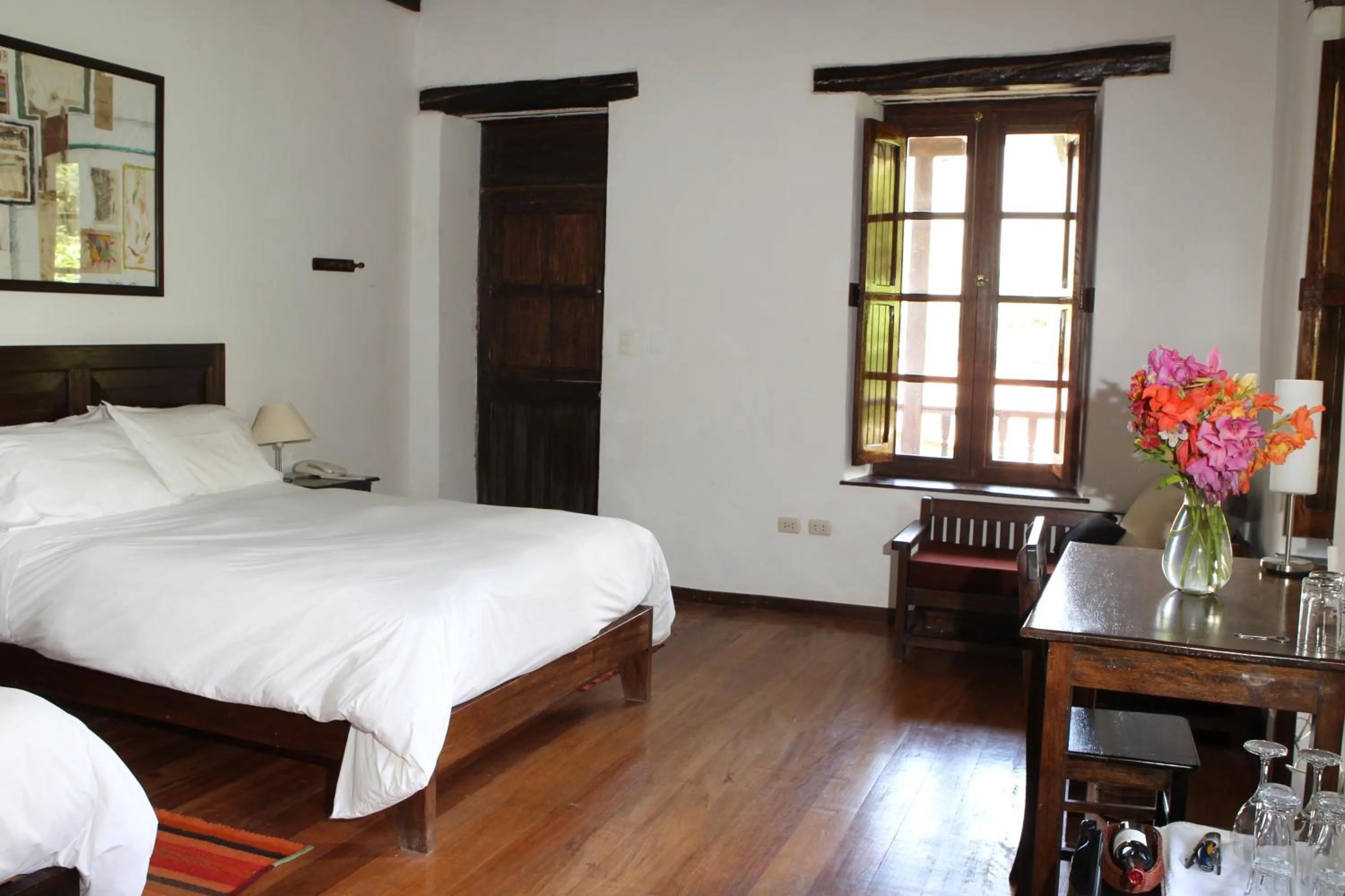 Photo of the whole room, Bed in El Albergue Ollantaytambo