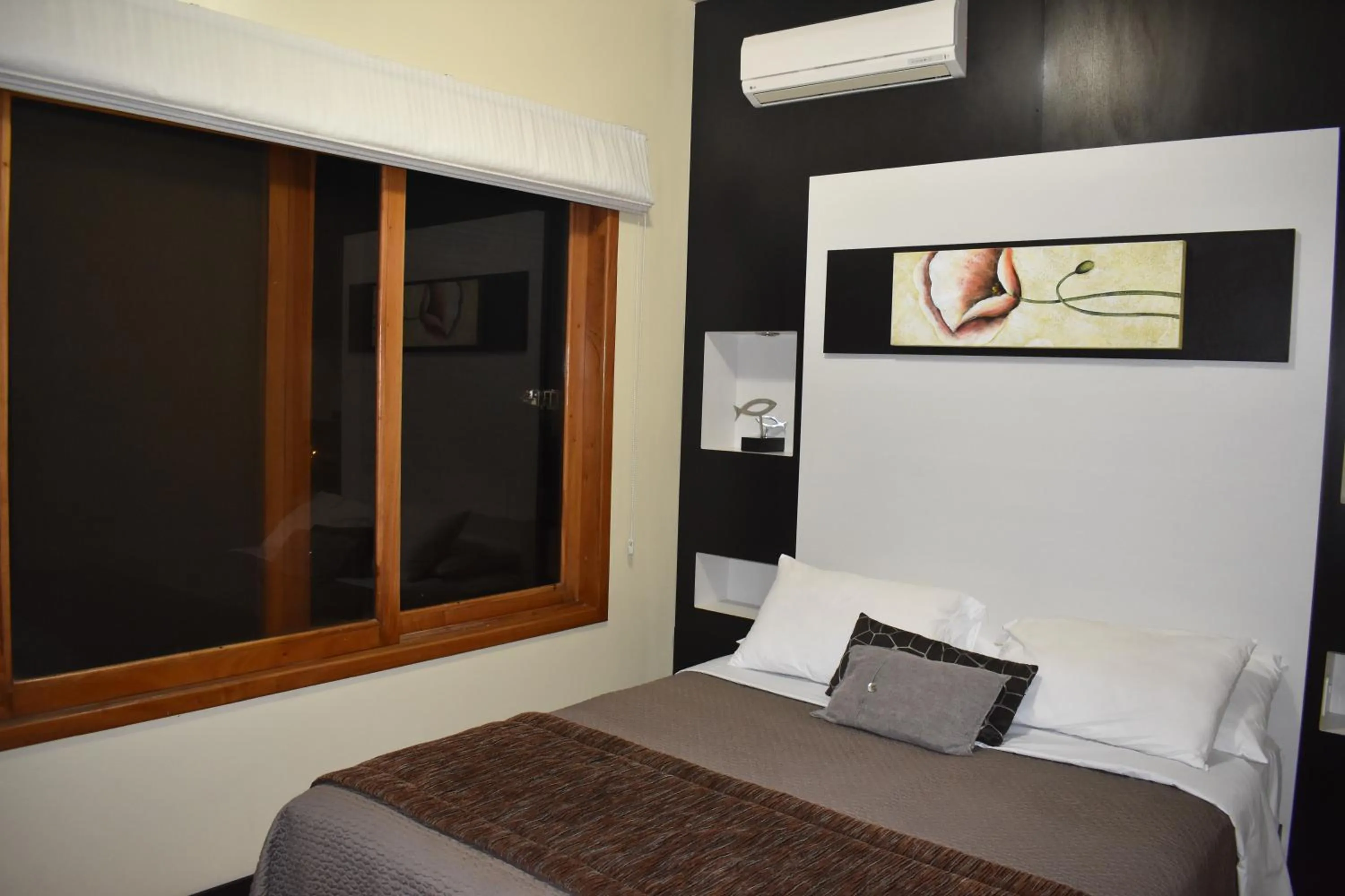 Bed in Hotel La Laguna Galapagos