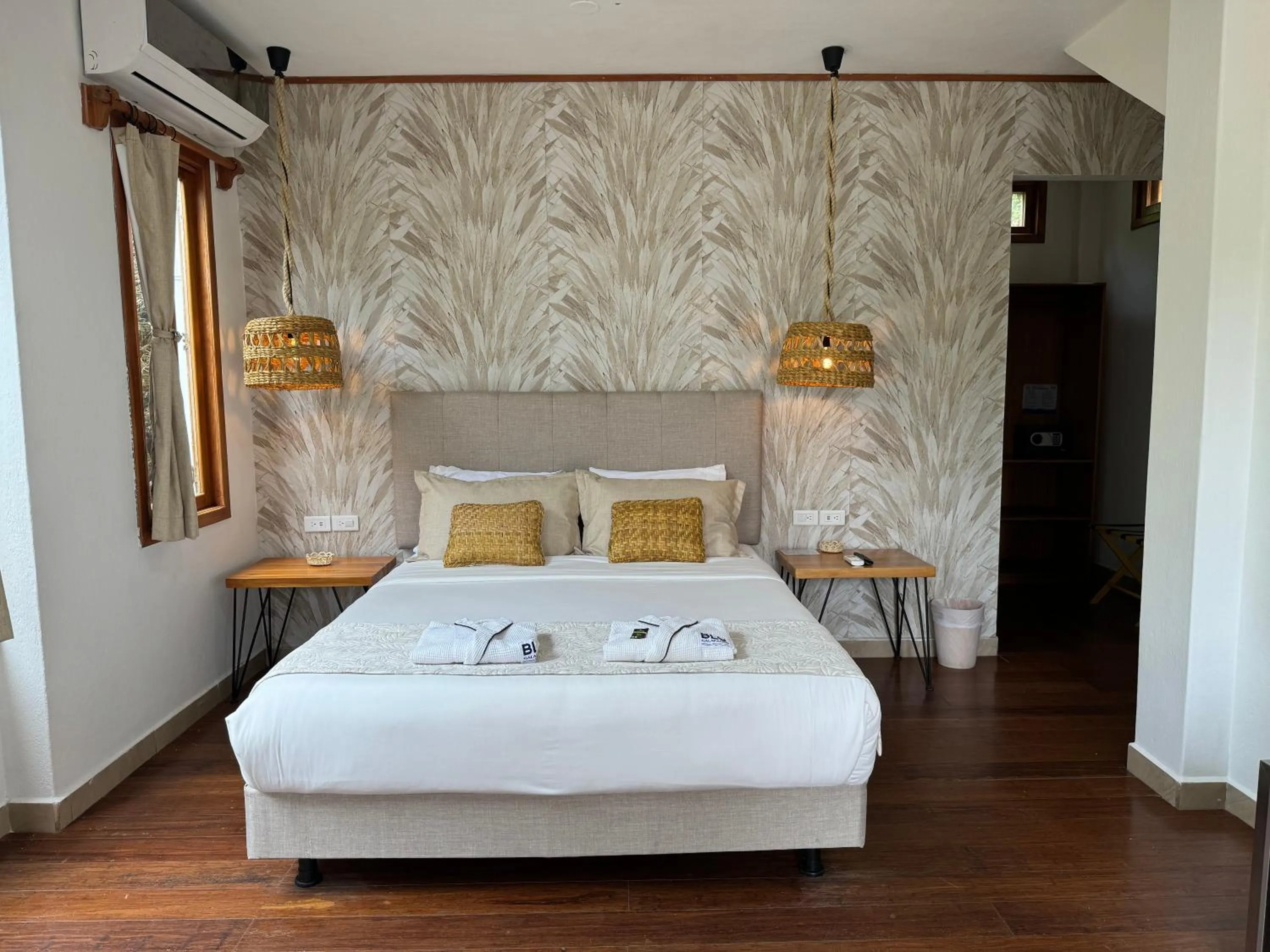 Bed in Blu Galapagos Sustainable Waterfront Lodge