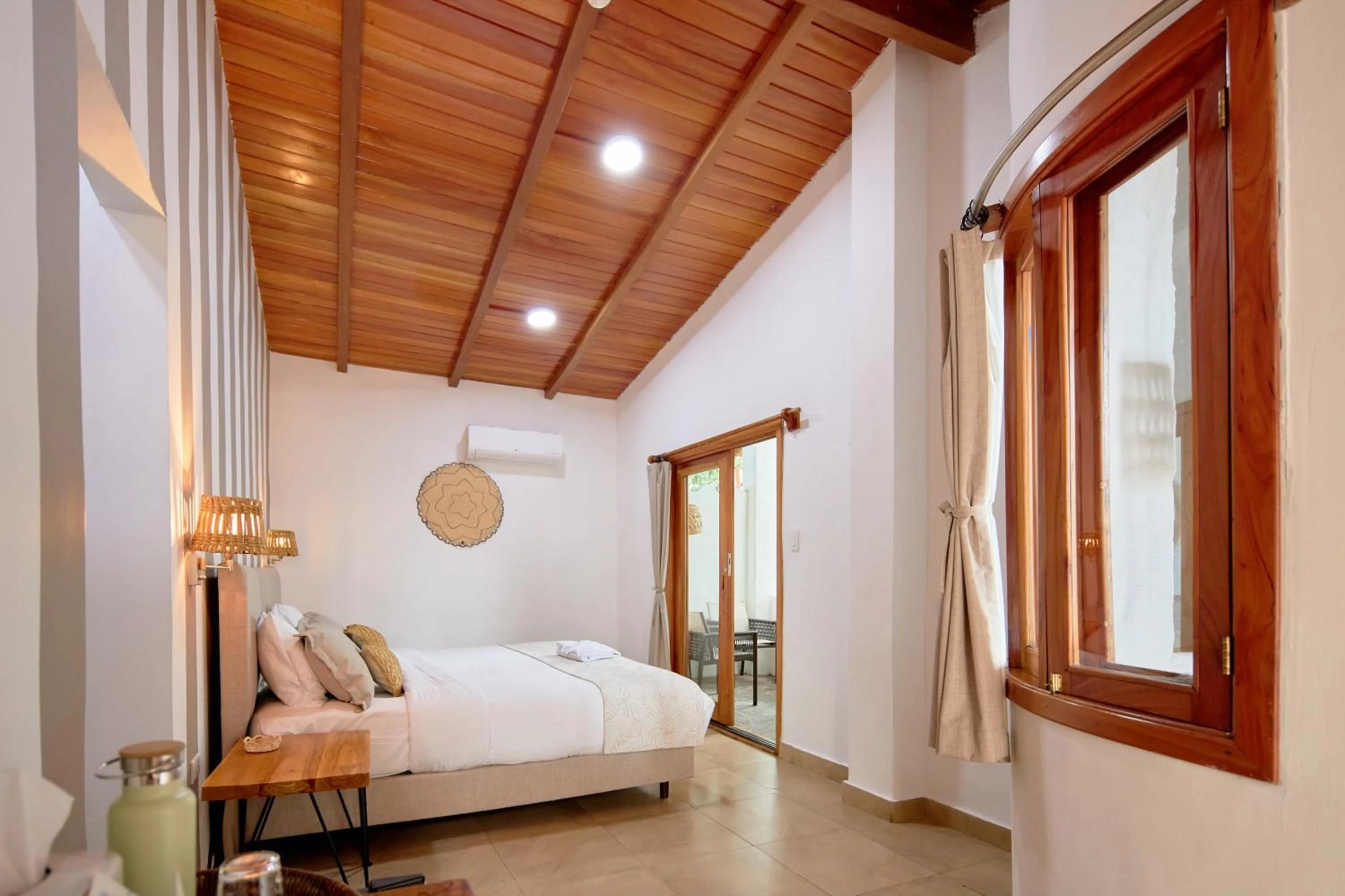 Bedroom, Bed in Blu Galapagos Sustainable Waterfront Lodge