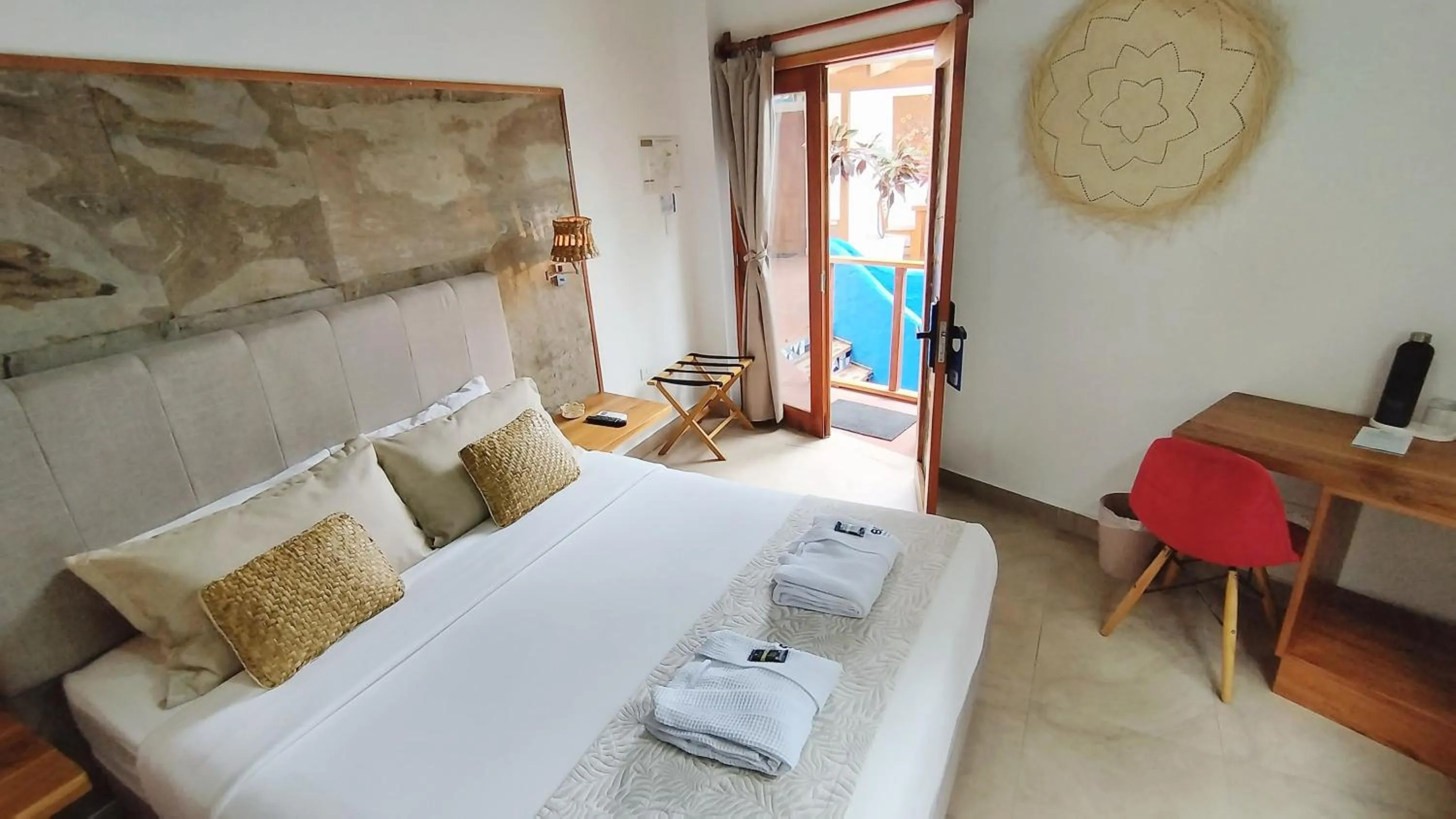 Bed in Blu Galapagos Sustainable Waterfront Lodge