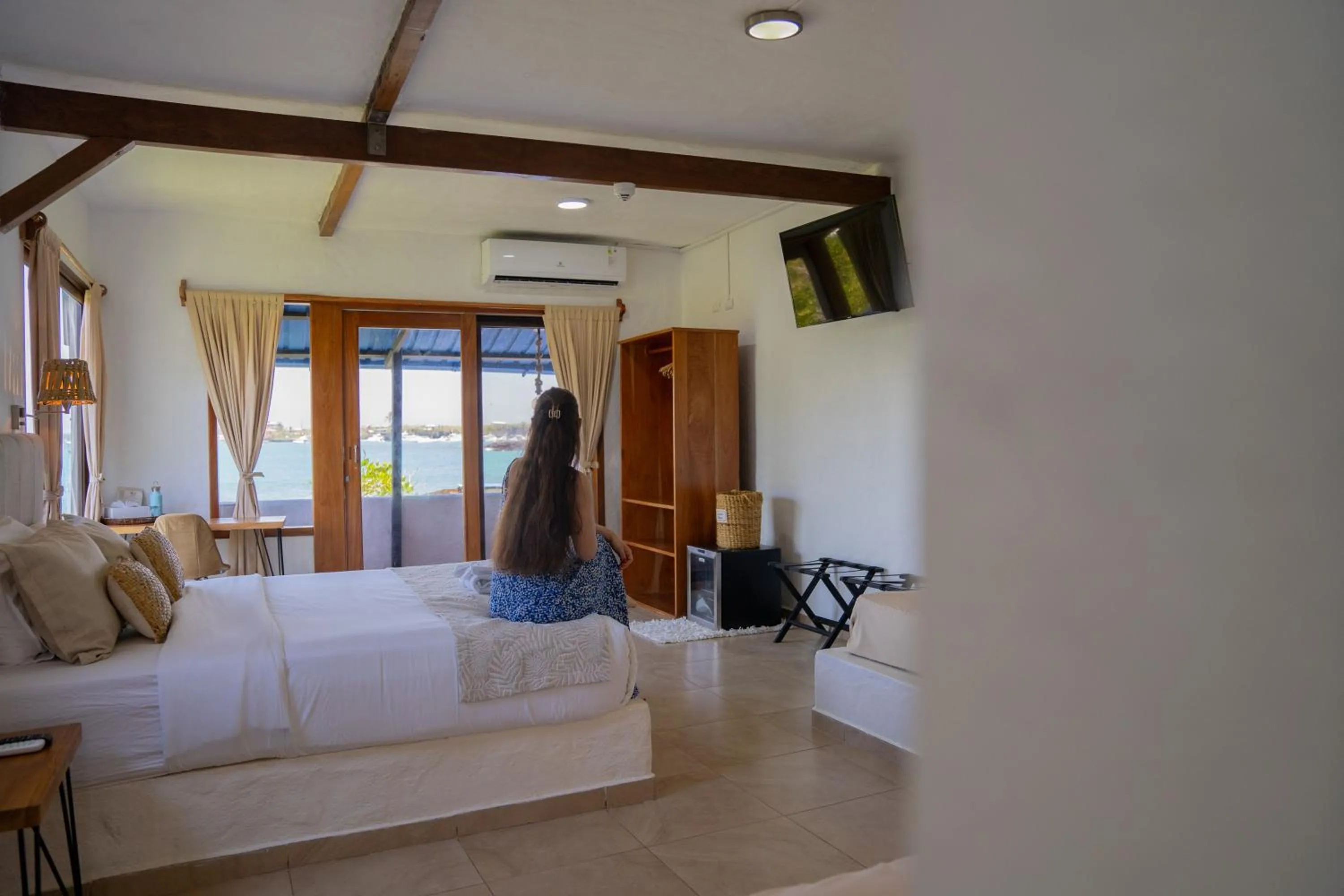 Bed in Blu Galapagos Sustainable Waterfront Lodge