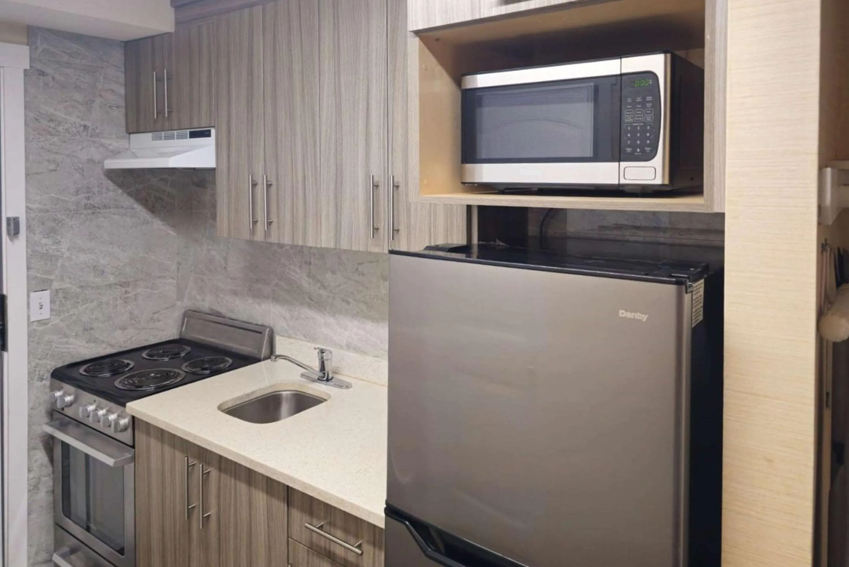 Bedroom in Rodeway Inn & Suites