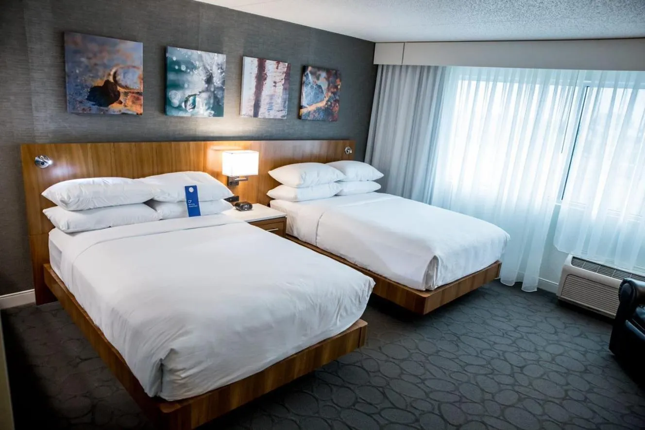 Bed in Delta Hotels by Marriott Fargo