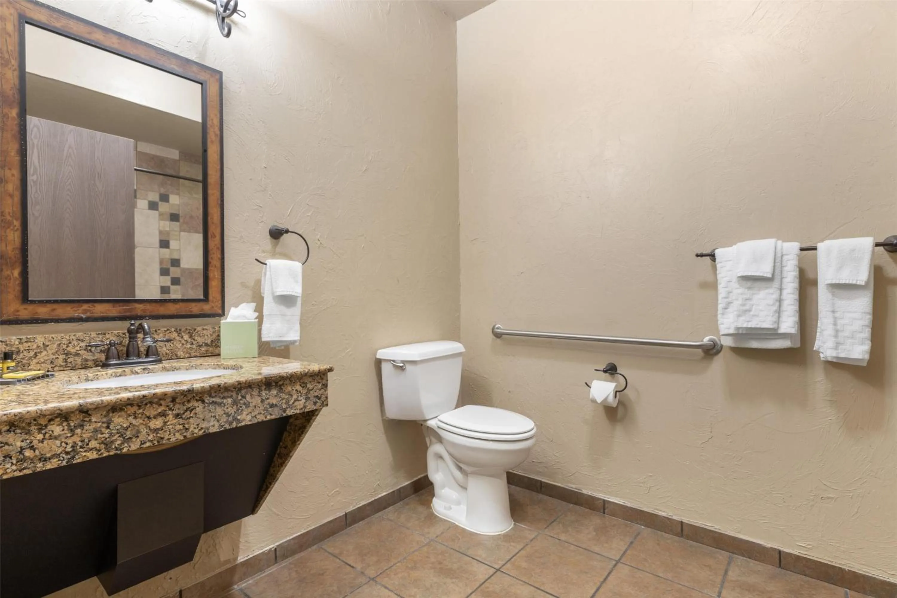 Bathroom in Best Western PLUS Cimarron Hotel & Suites