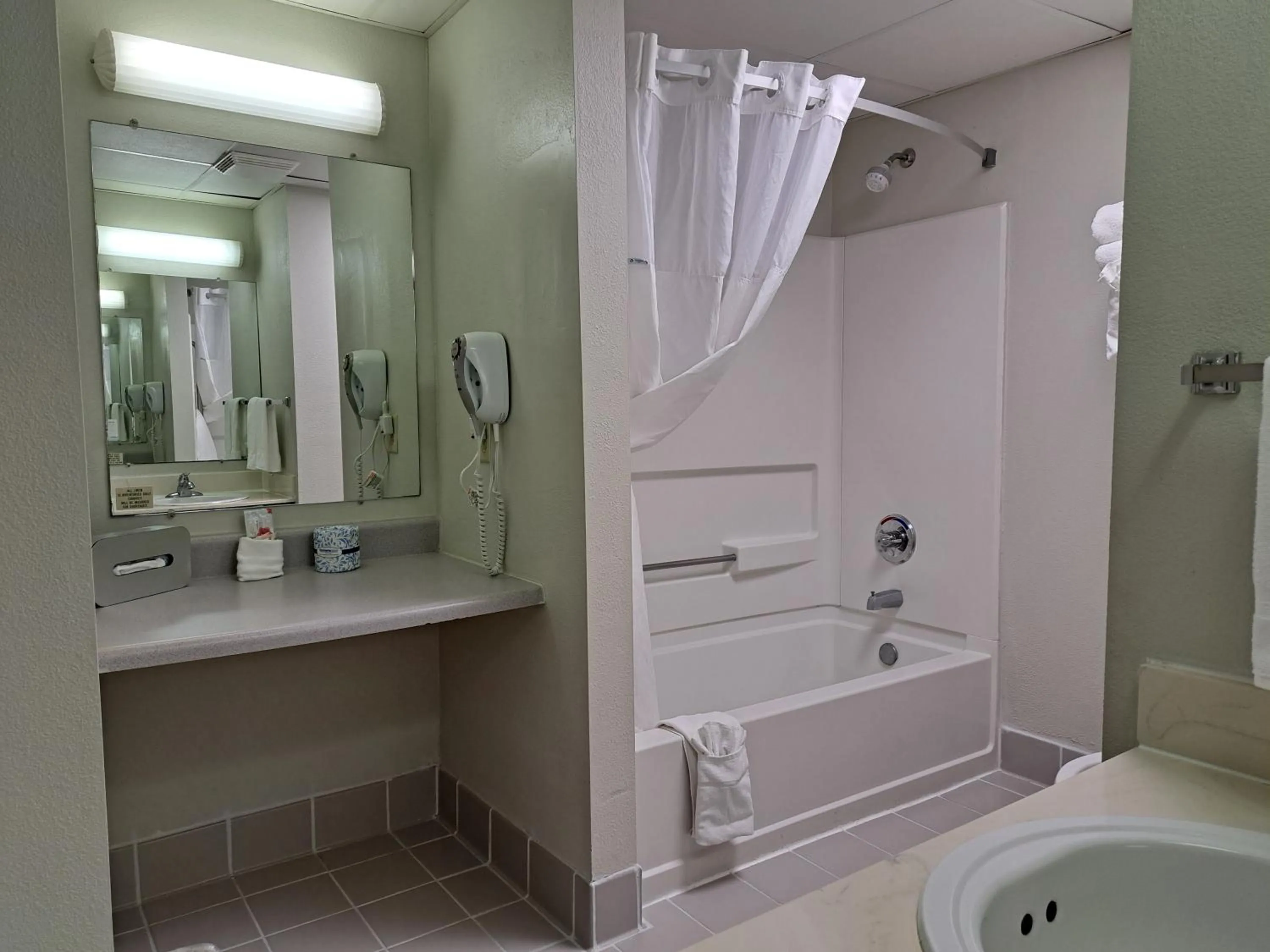 Bathroom in Days Inn & Suites by Wyndham Jekyll Island