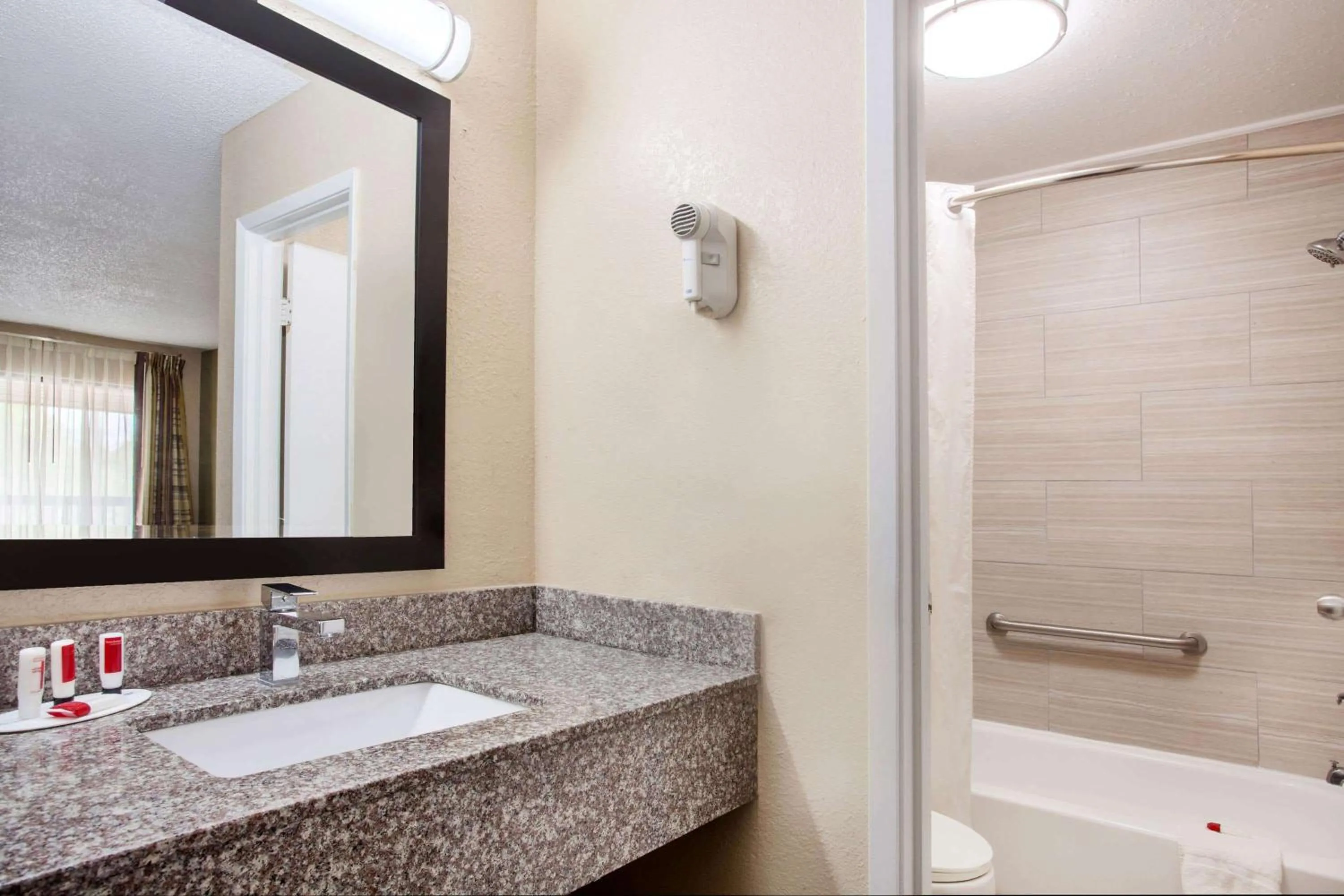 Bathroom in Baymont by Wyndham Lake City I-75