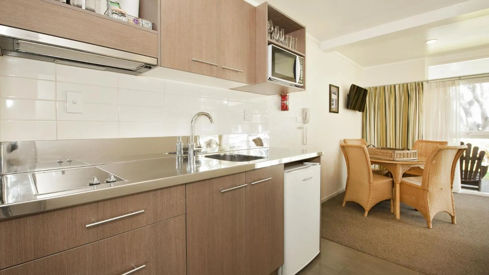 Kitchen or kitchenette in Hananui Lodge and Apartments