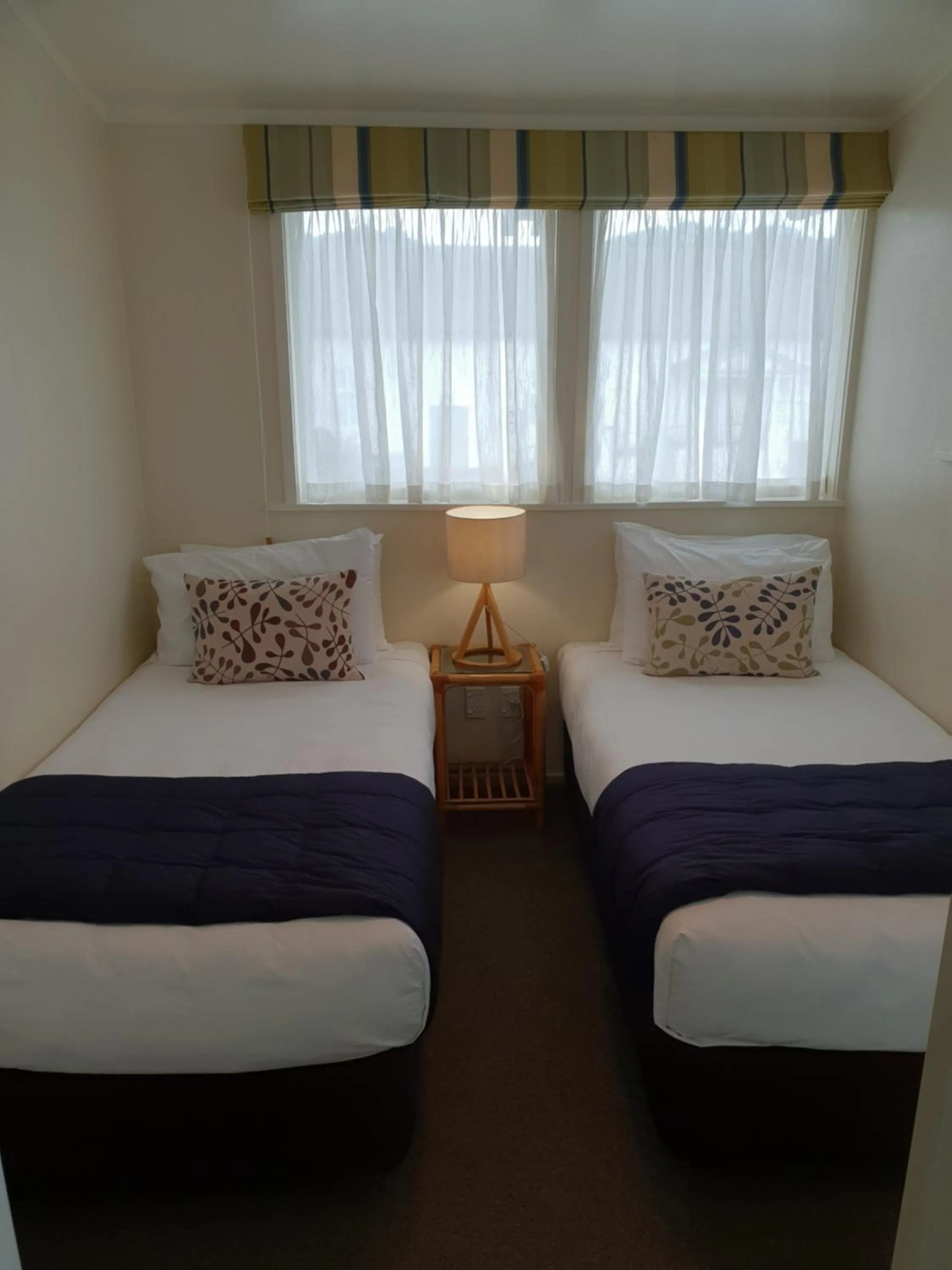 Bedroom, Bed in Hananui Lodge and Apartments