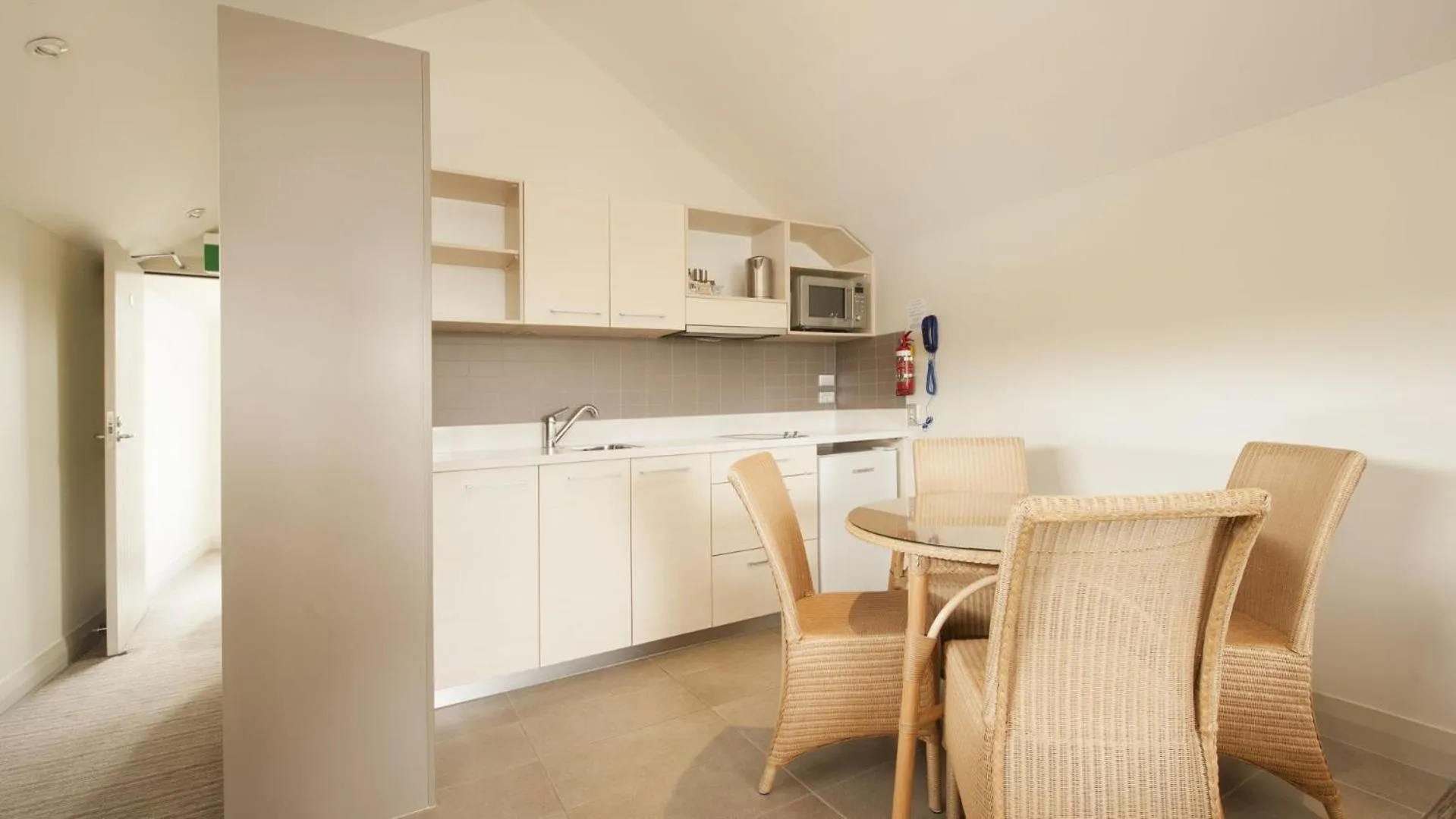 Kitchen or kitchenette in Hananui Lodge and Apartments