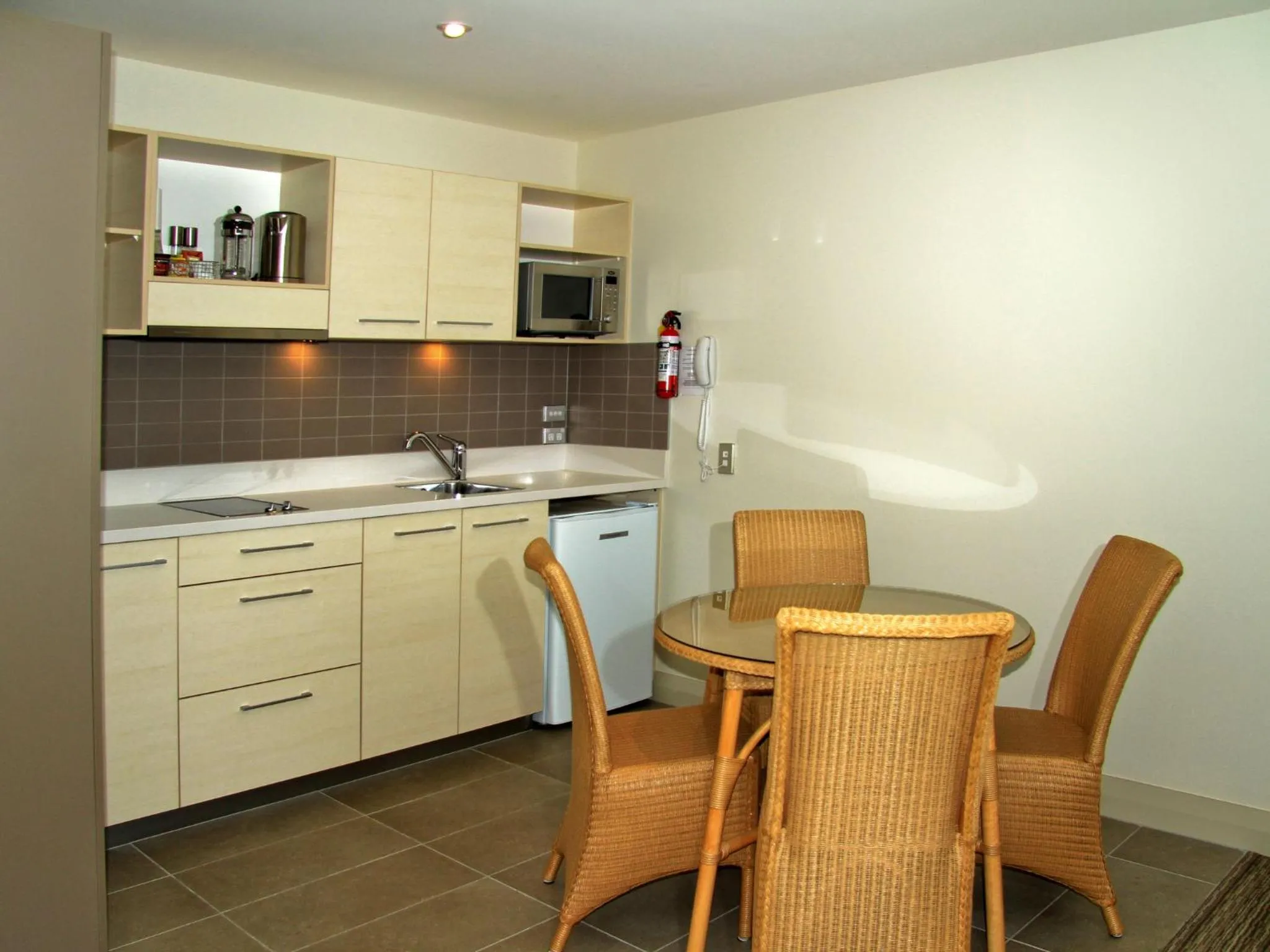 Kitchen or kitchenette in Hananui Lodge and Apartments