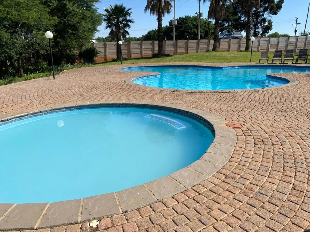 Swimming pool in Be My Guest Hotel Conference