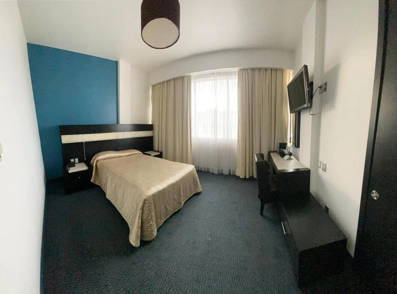 Bed in Hotel Real Rex