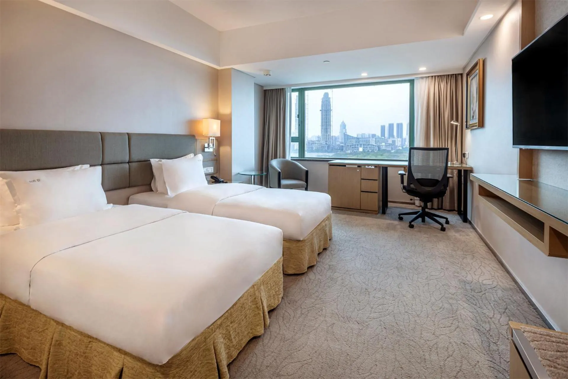 Bed in Holiday Inn Wuhan Riverside by IHG